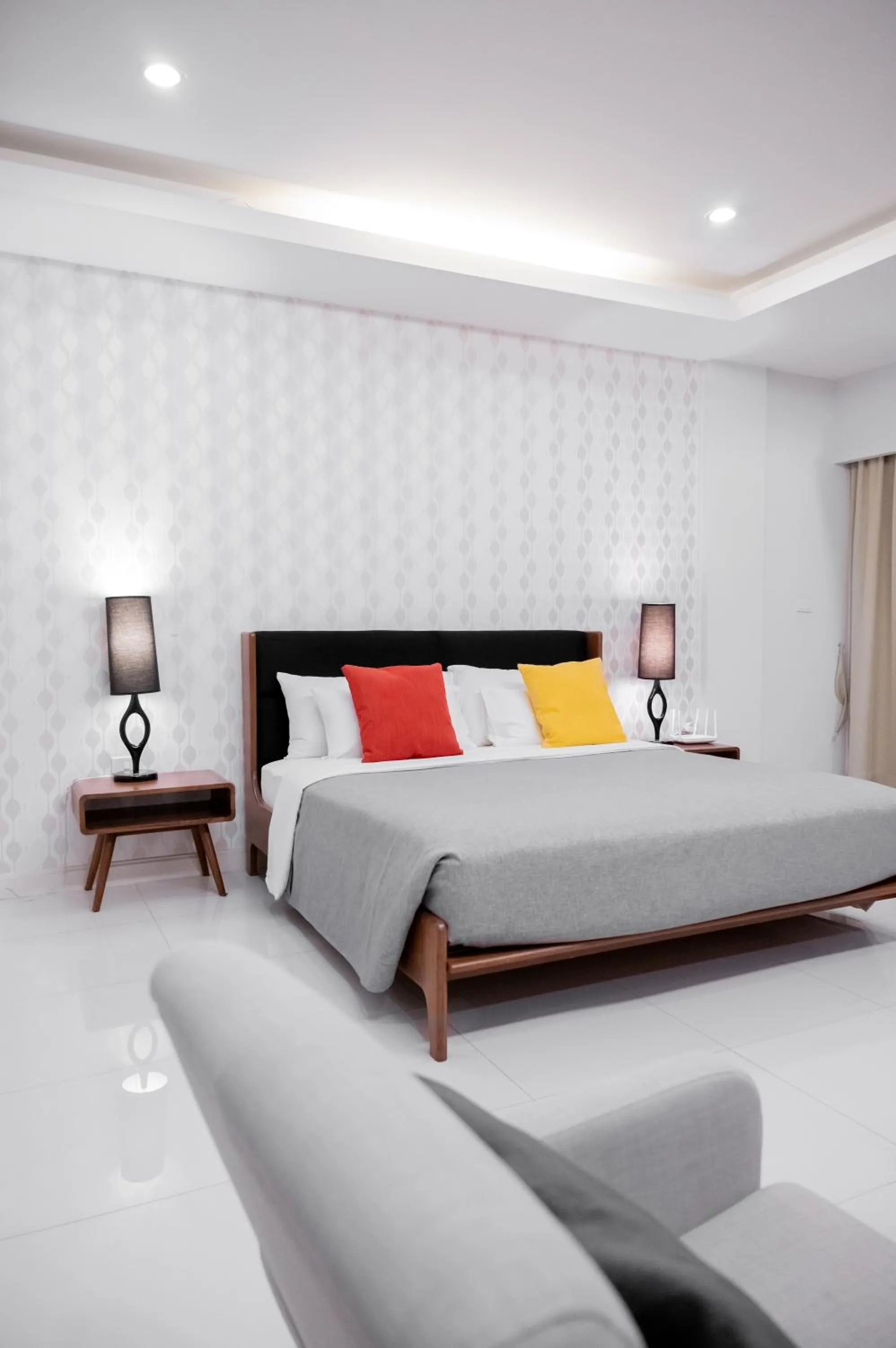 Bed in Tolani Nimman Villa Chiang Mai