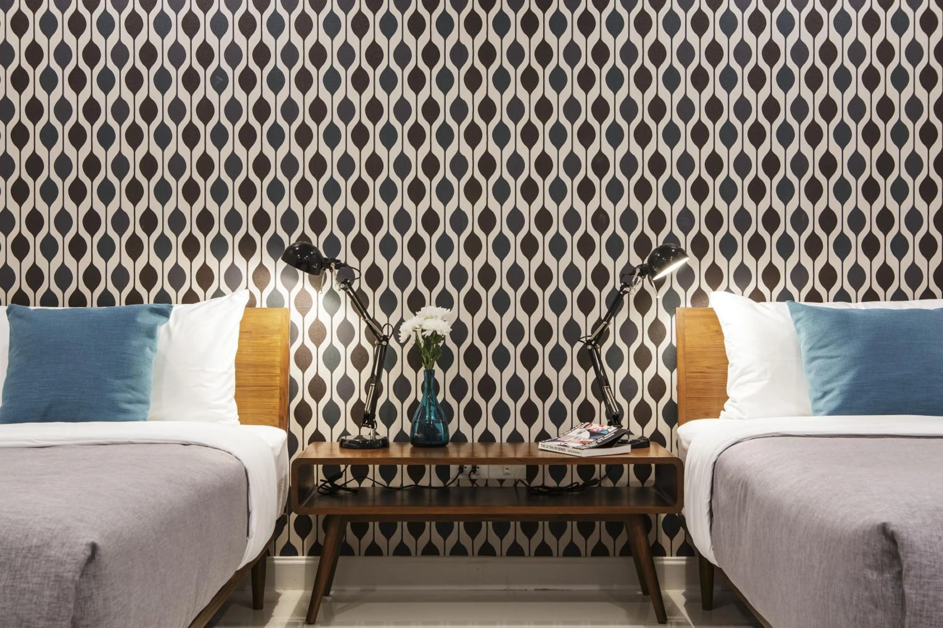 Bed in Tolani Nimman Villa Chiang Mai