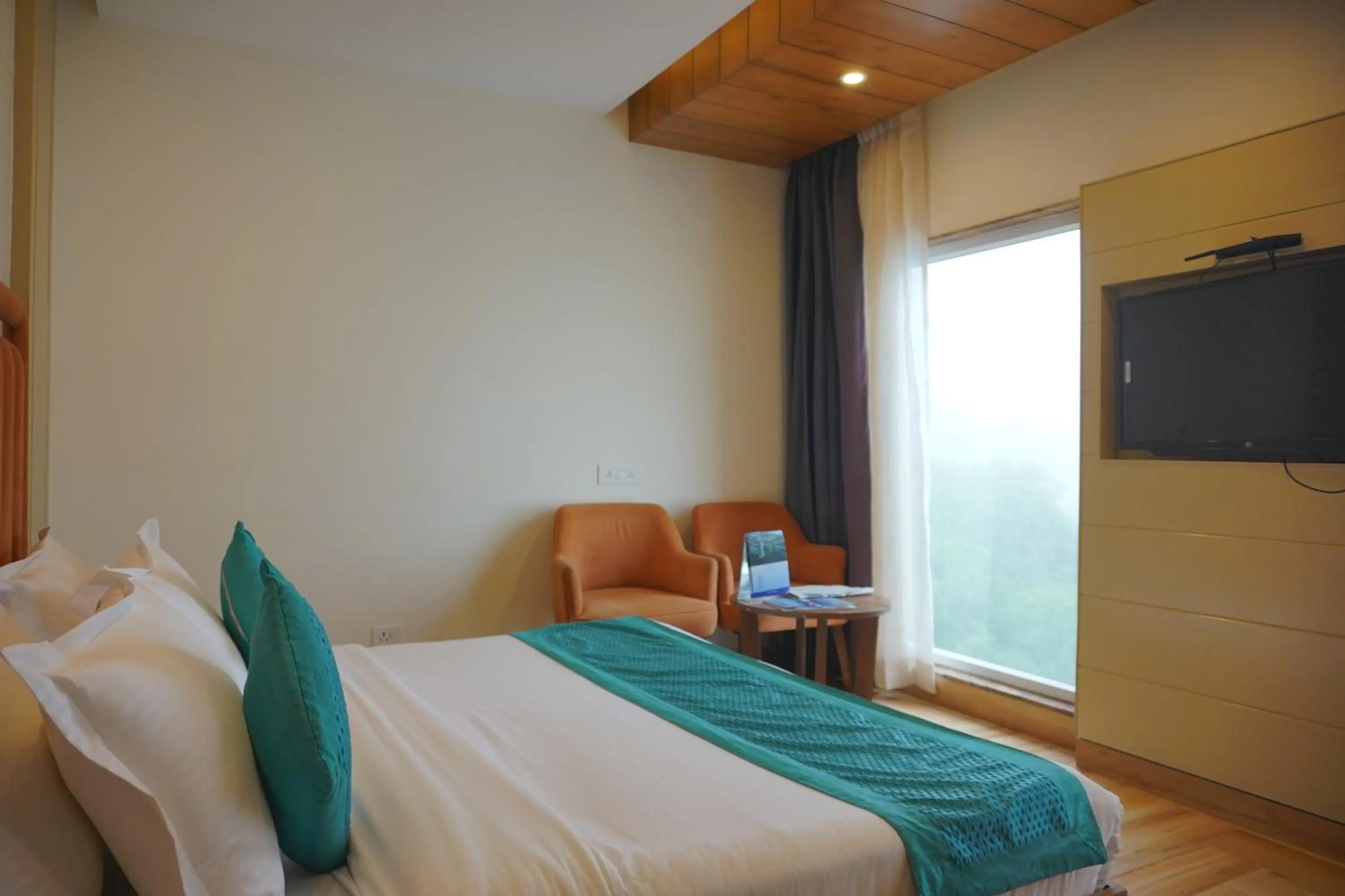 Bed in Luxury Inn by Stotrak Hotels