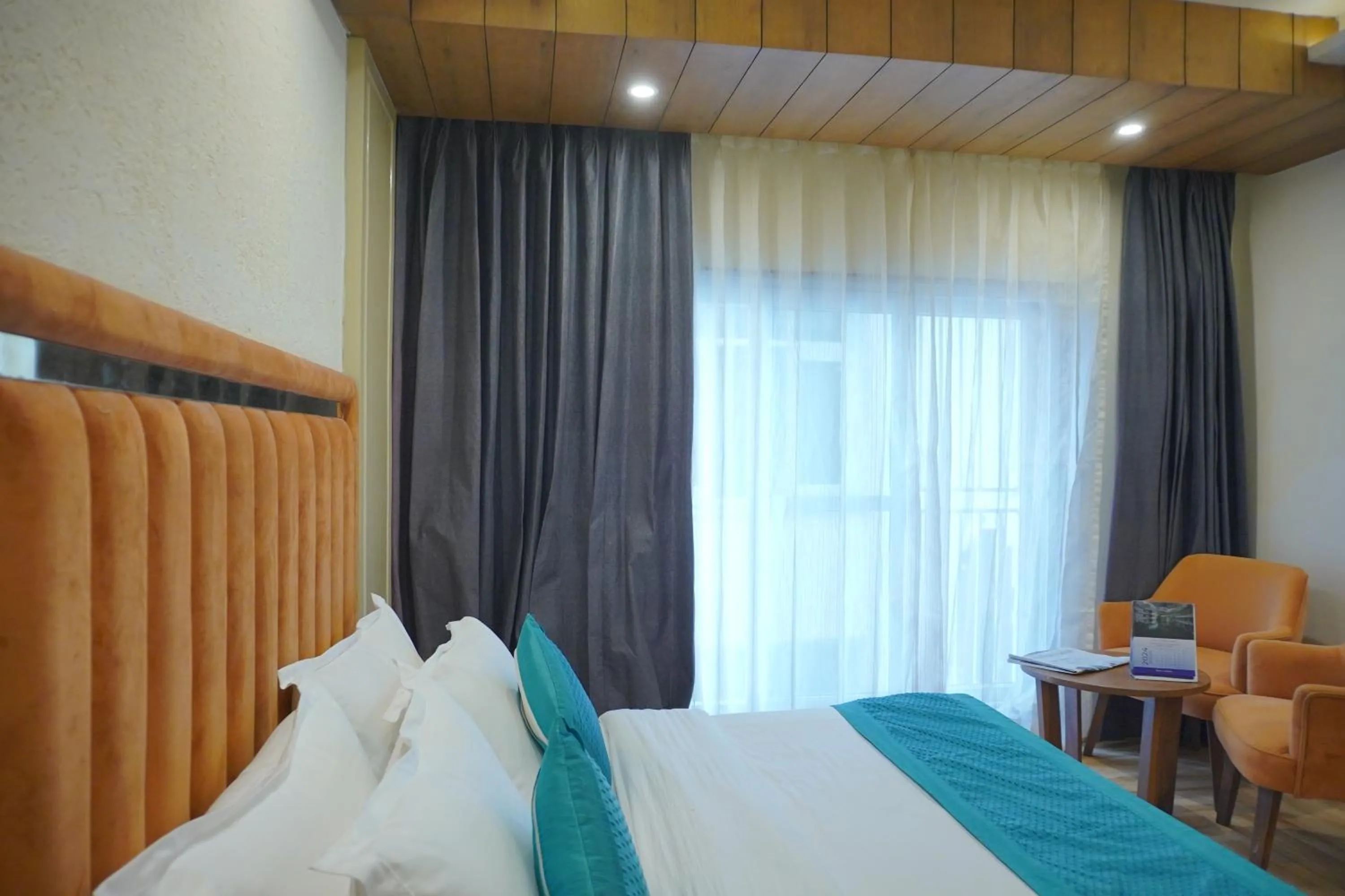Bed in Luxury Inn by Stotrak Hotels