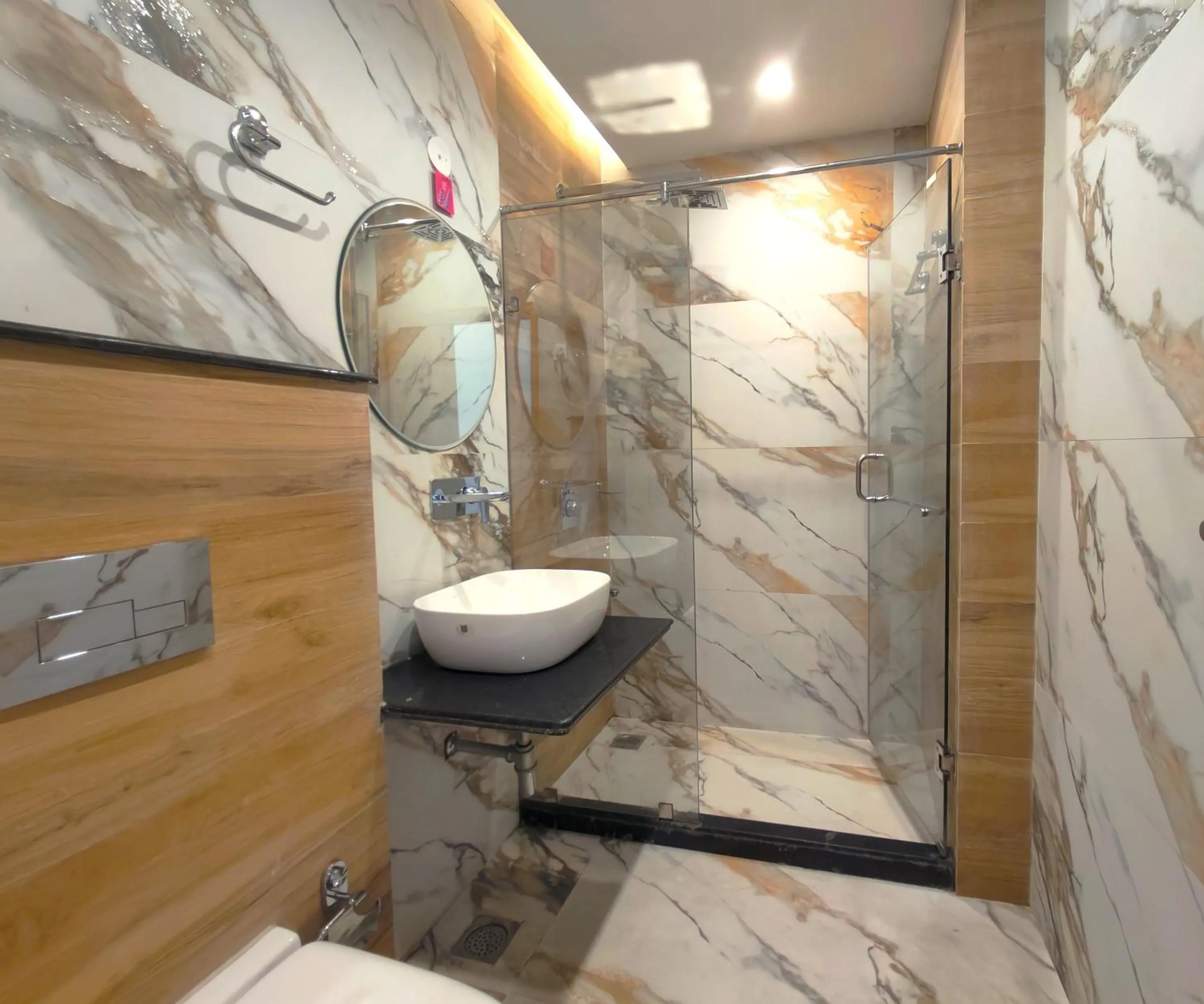 Shower in Luxury Inn by Stotrak Hotels