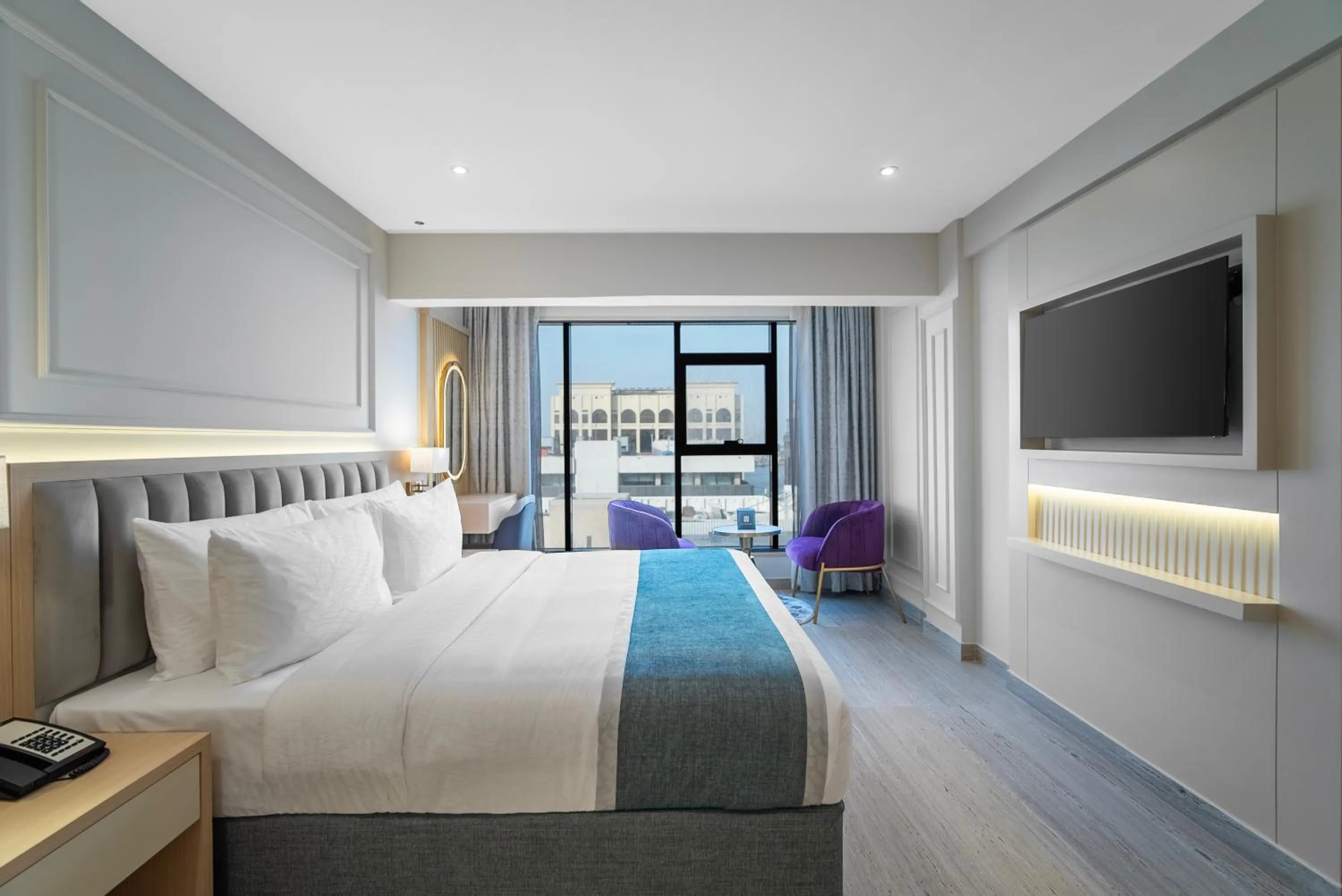 Bedroom, Bed in Grand Ambassador Hotel