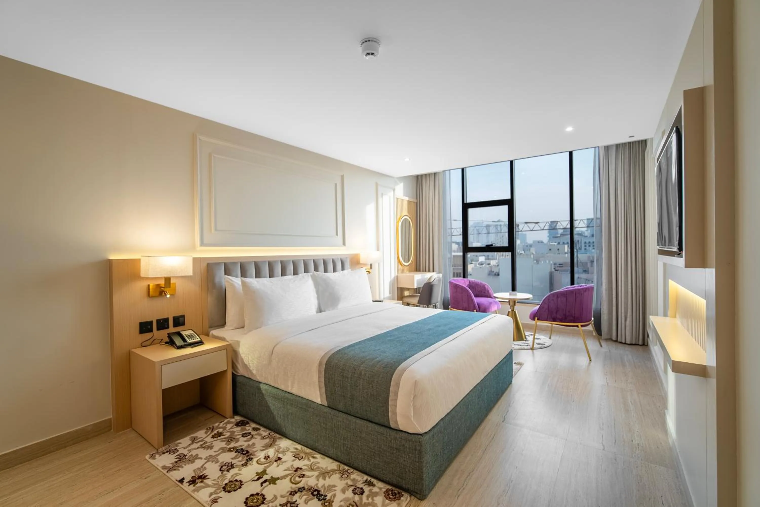 Bedroom, Bed in Grand Ambassador Hotel