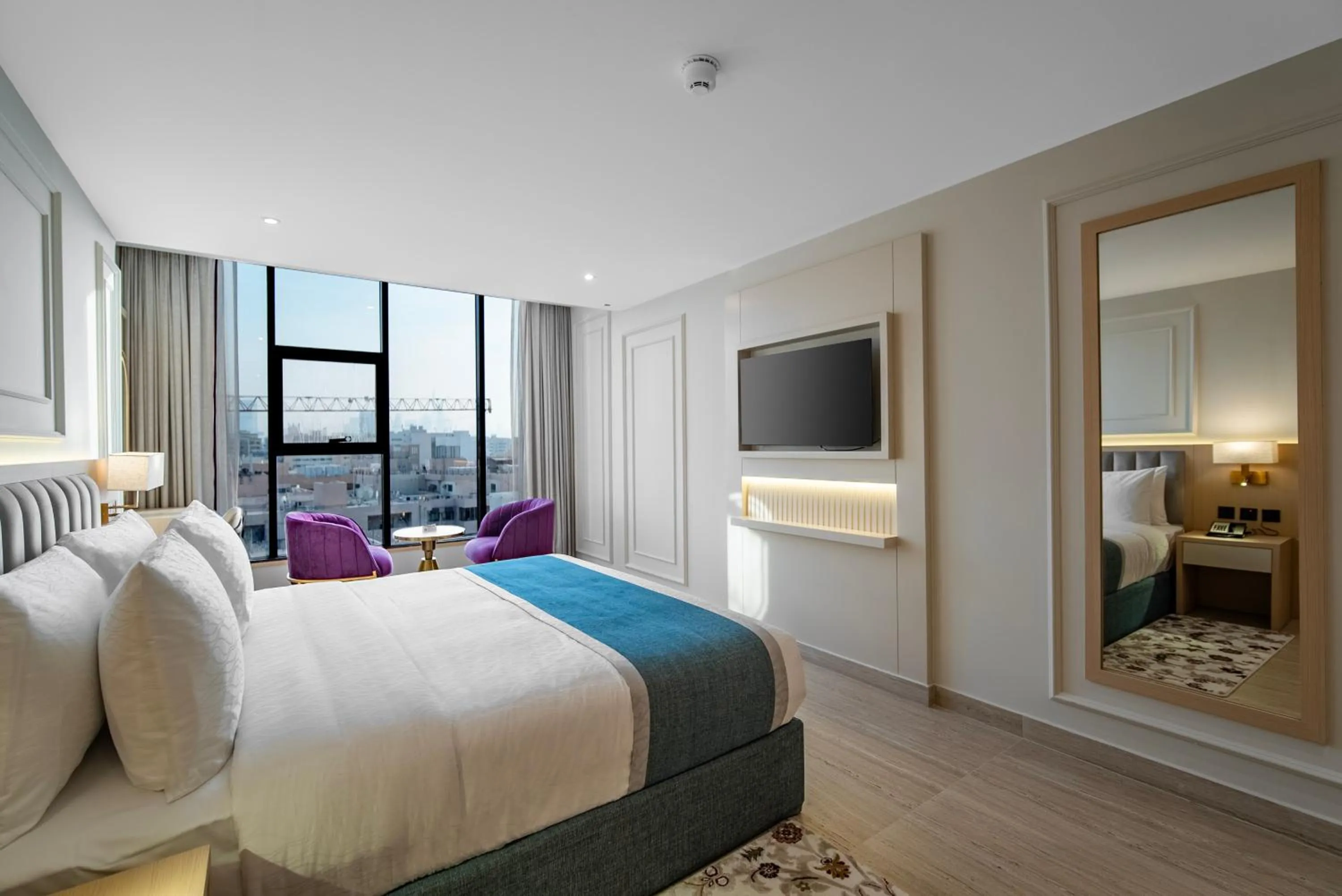 Bedroom, Bed in Grand Ambassador Hotel