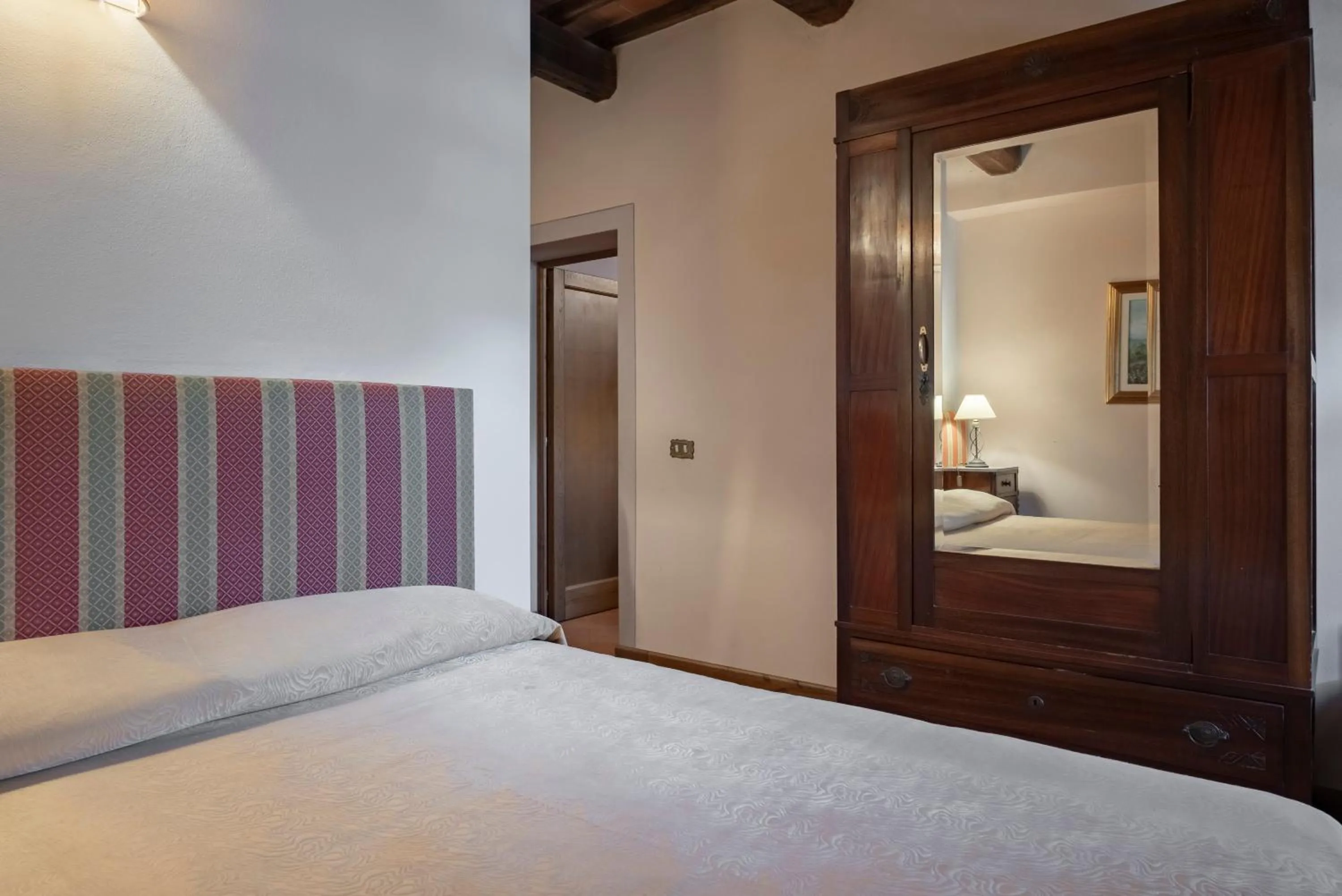 Decorative detail, Bed in Villaggio Albergo San Lorenzo e Santa Caterina