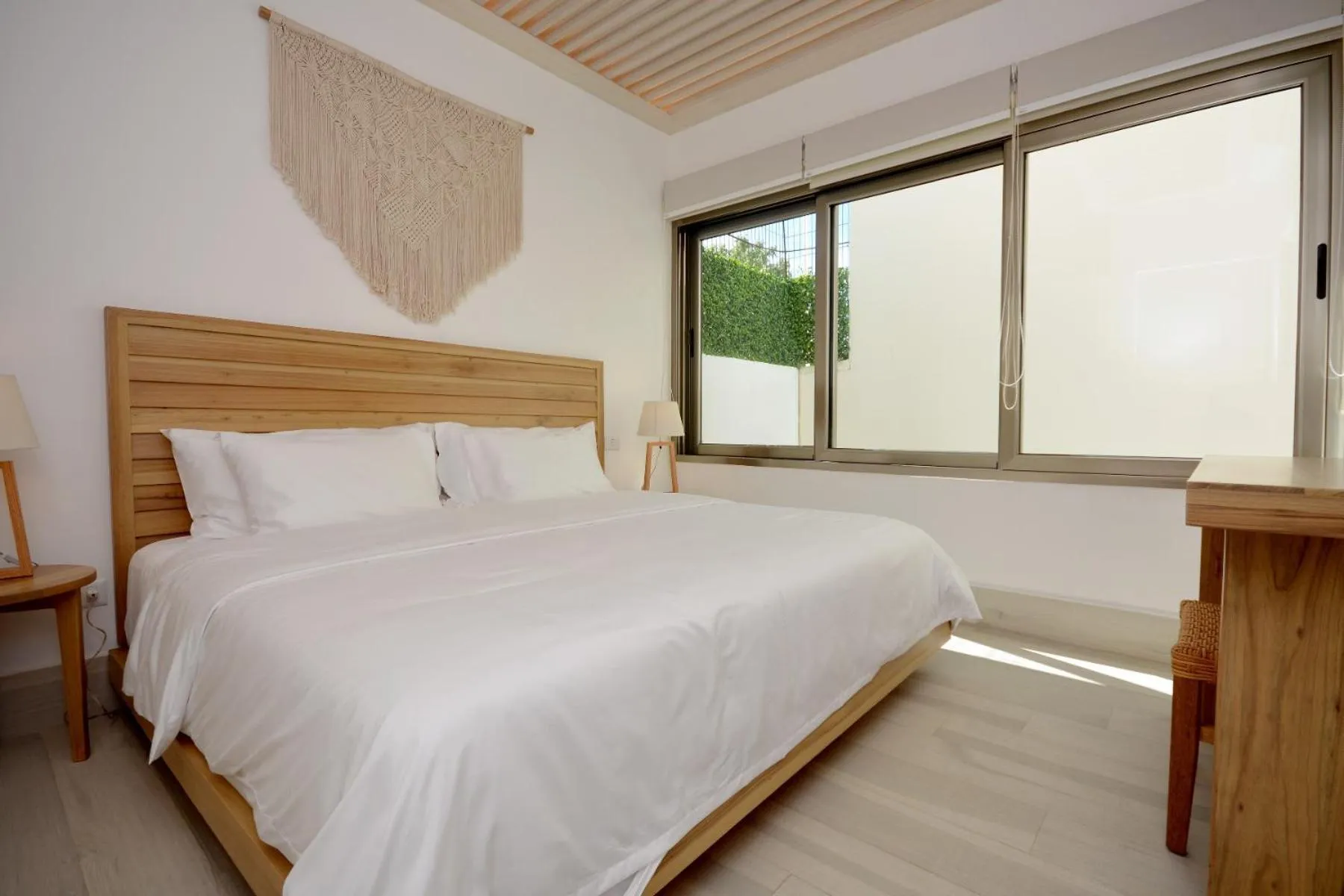 Bed in Mayan Monk Suites