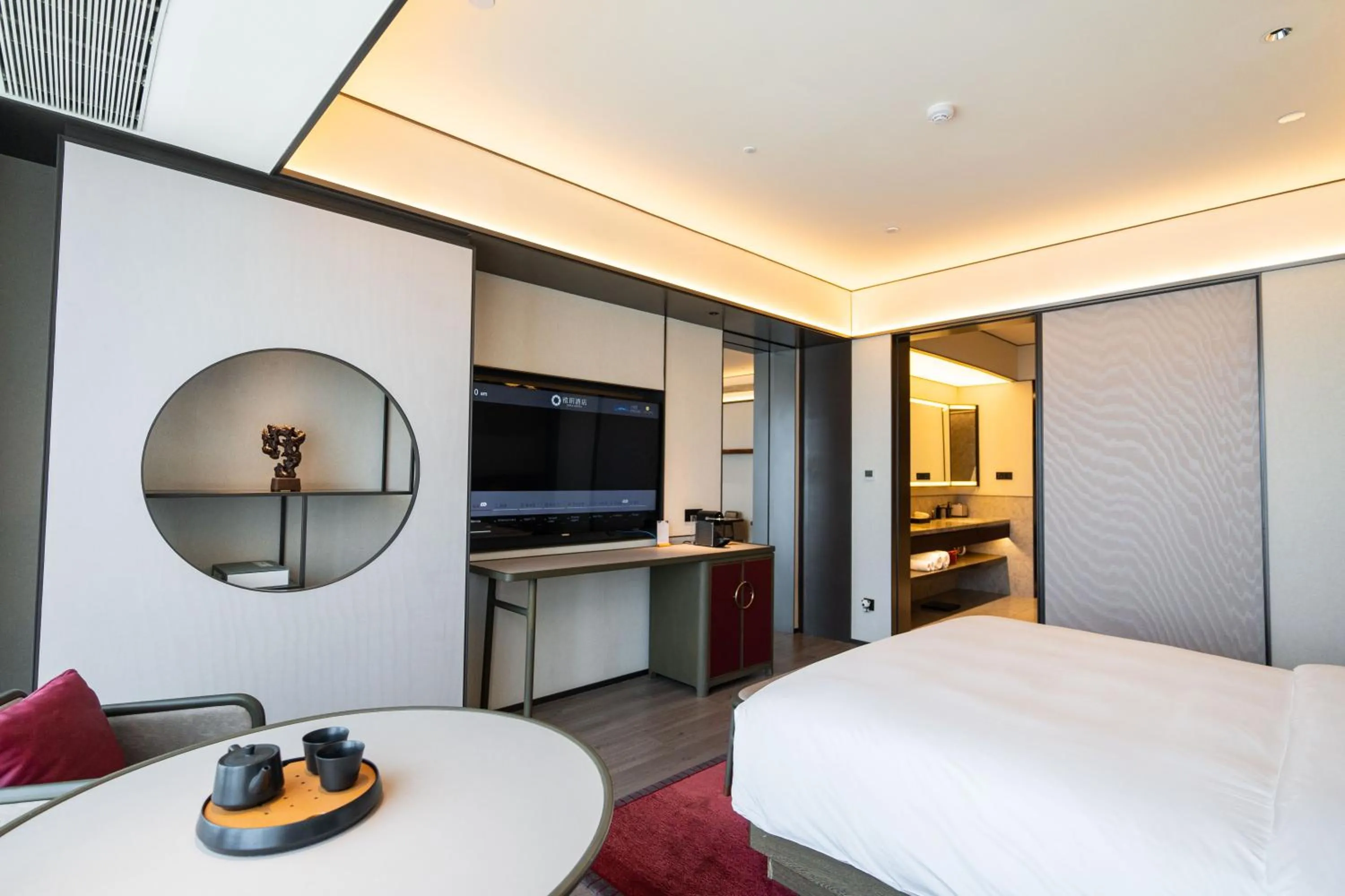 Photo of the whole room, Bed in JOYA Hangzhou Qianjiang New Town