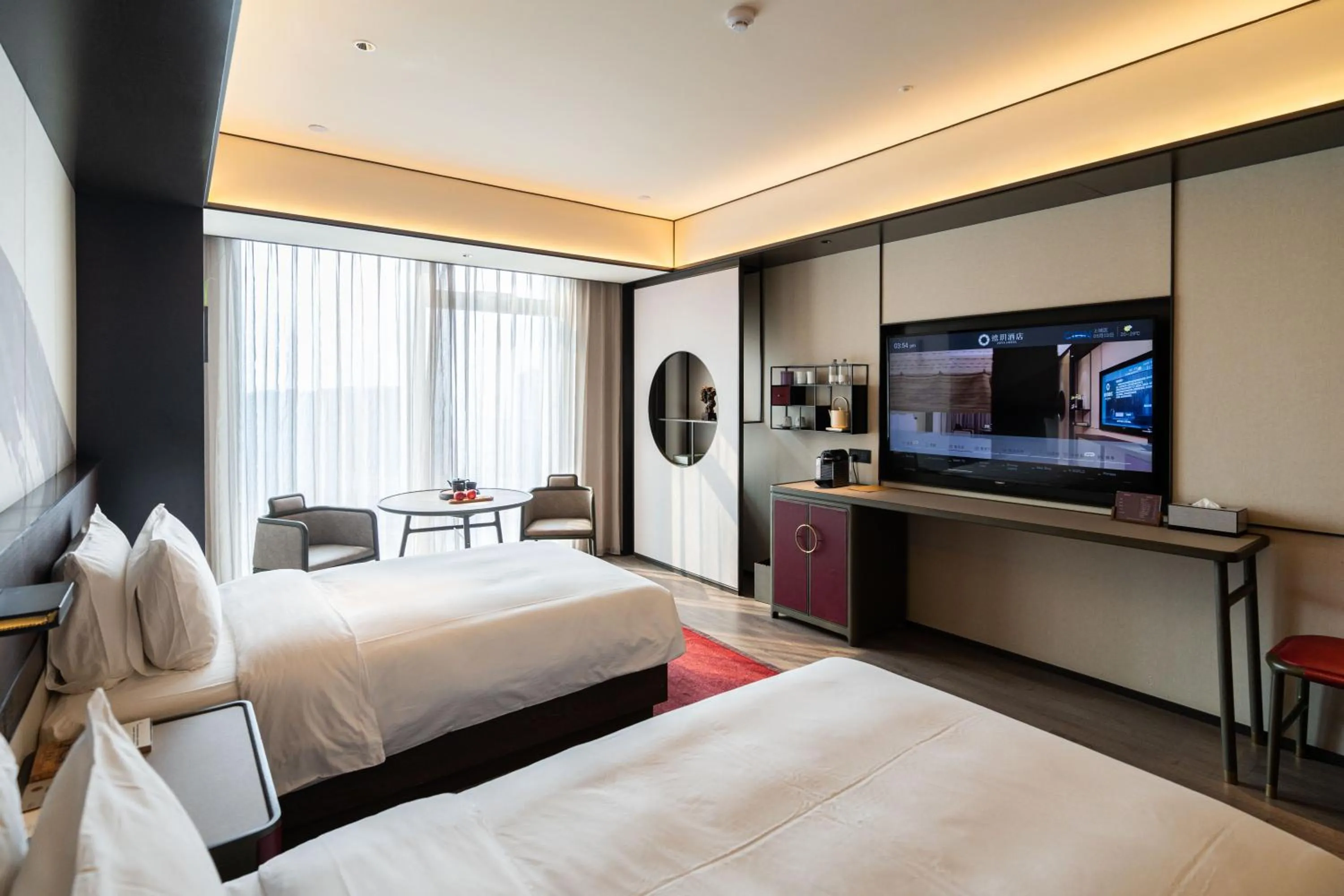 Photo of the whole room, Bed in JOYA Hangzhou Qianjiang New Town