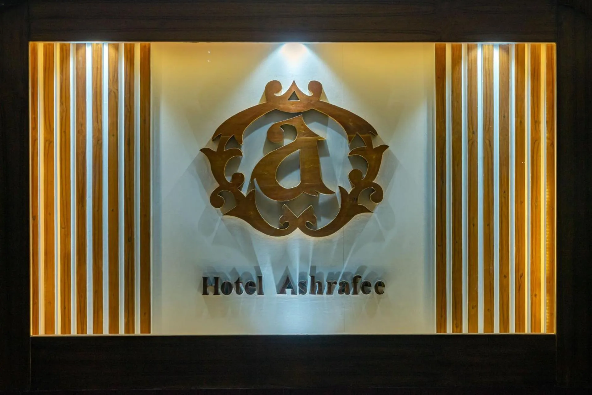Property logo or sign in Hotel Ashrafee