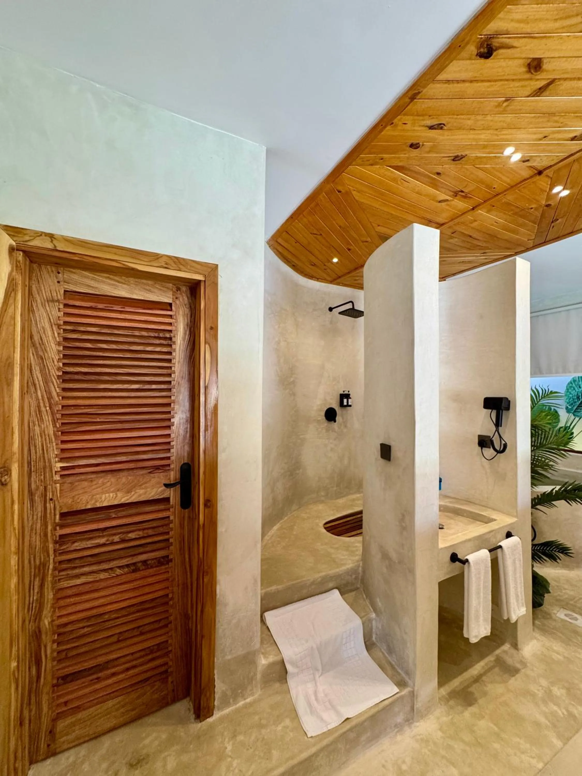 Shower in Kai Zanzibar Hotel and Spa