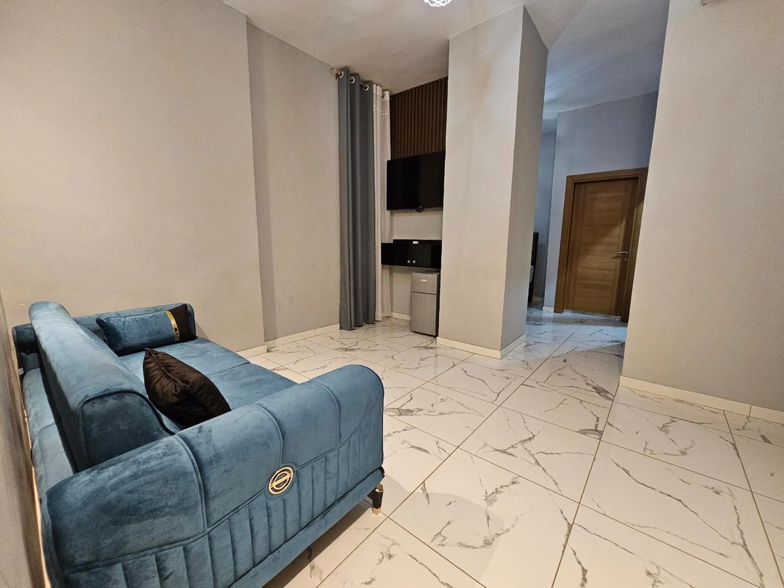 Communal lounge/ TV room in Albatros Premium Hôtel