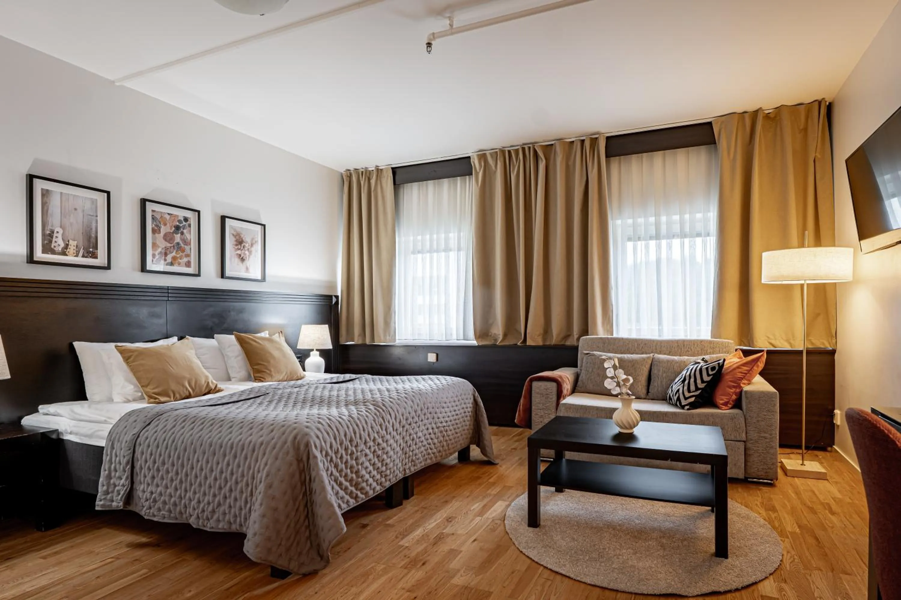 Bed in Injoy Premium Hotel Solna