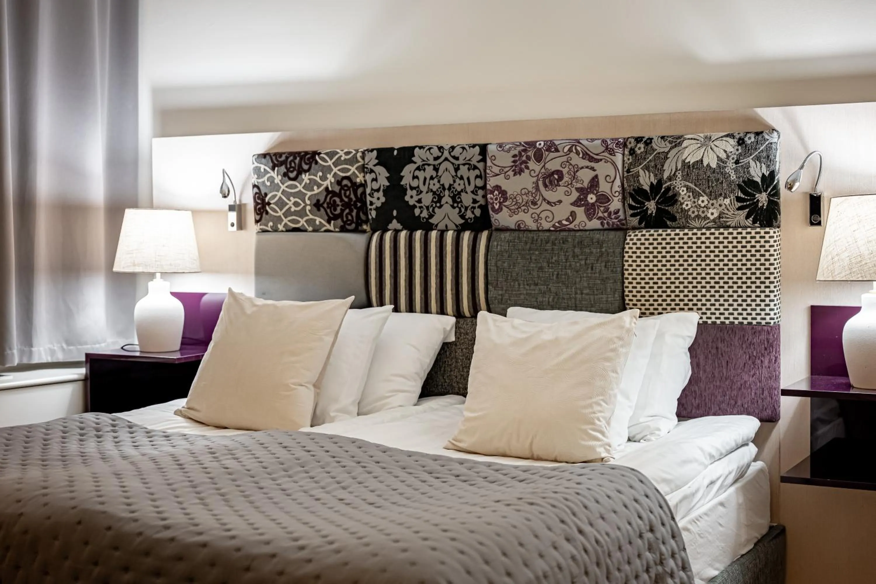 Bed in Injoy Premium Hotel Solna