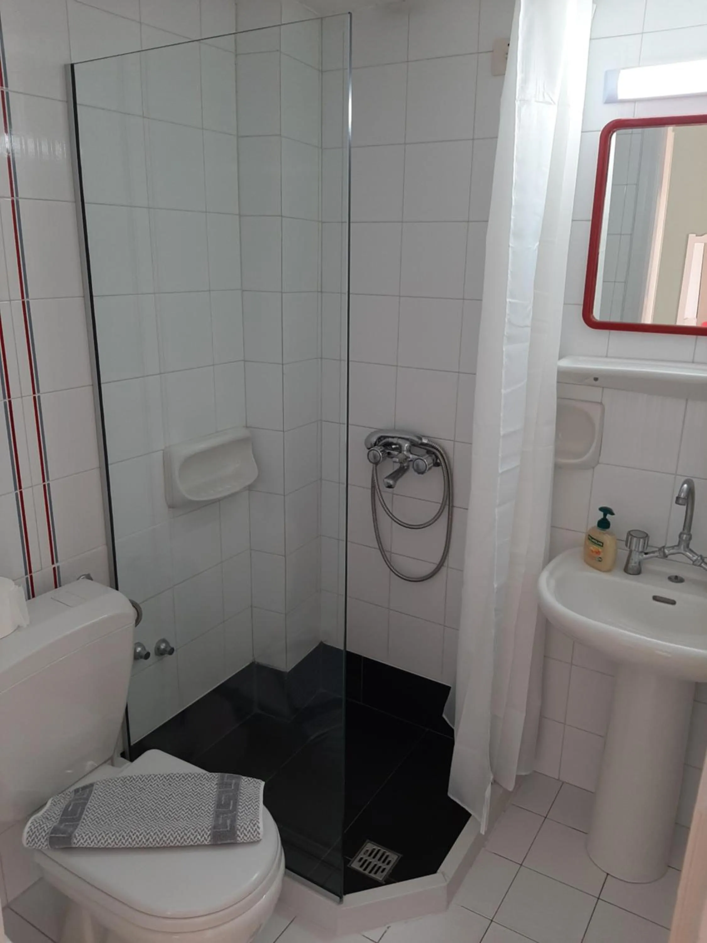 Bathroom in Remi Apartments