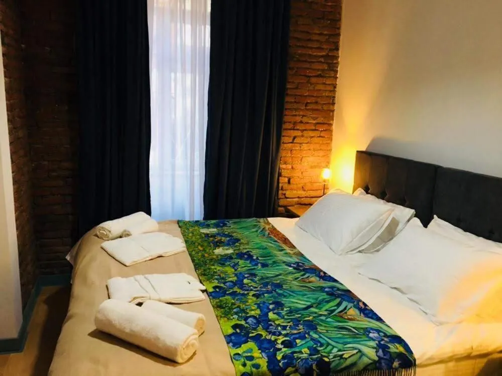 Bed in Ethnograph Hotel old Tbilisi
