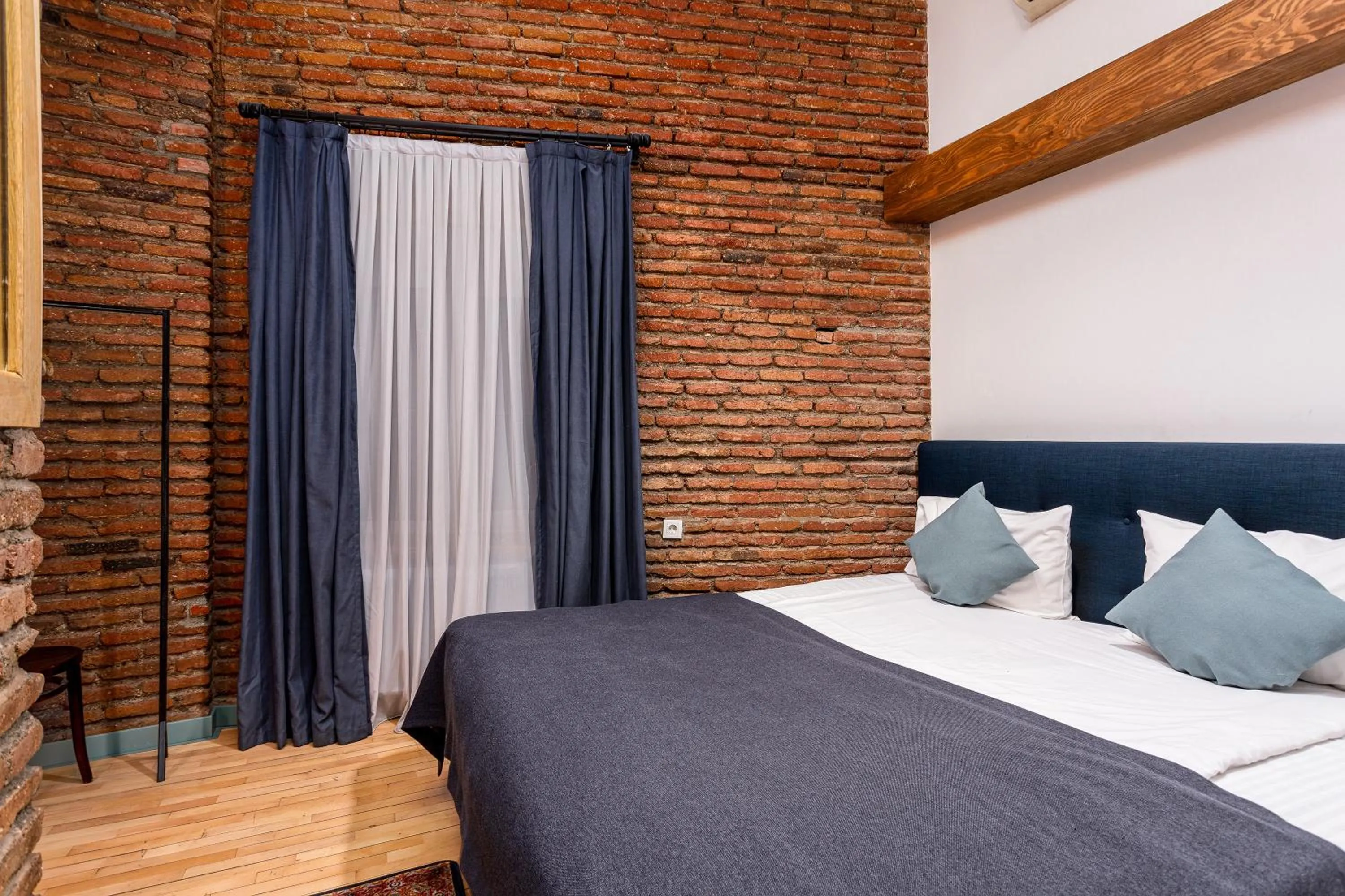Bed in Ethnograph Hotel old Tbilisi
