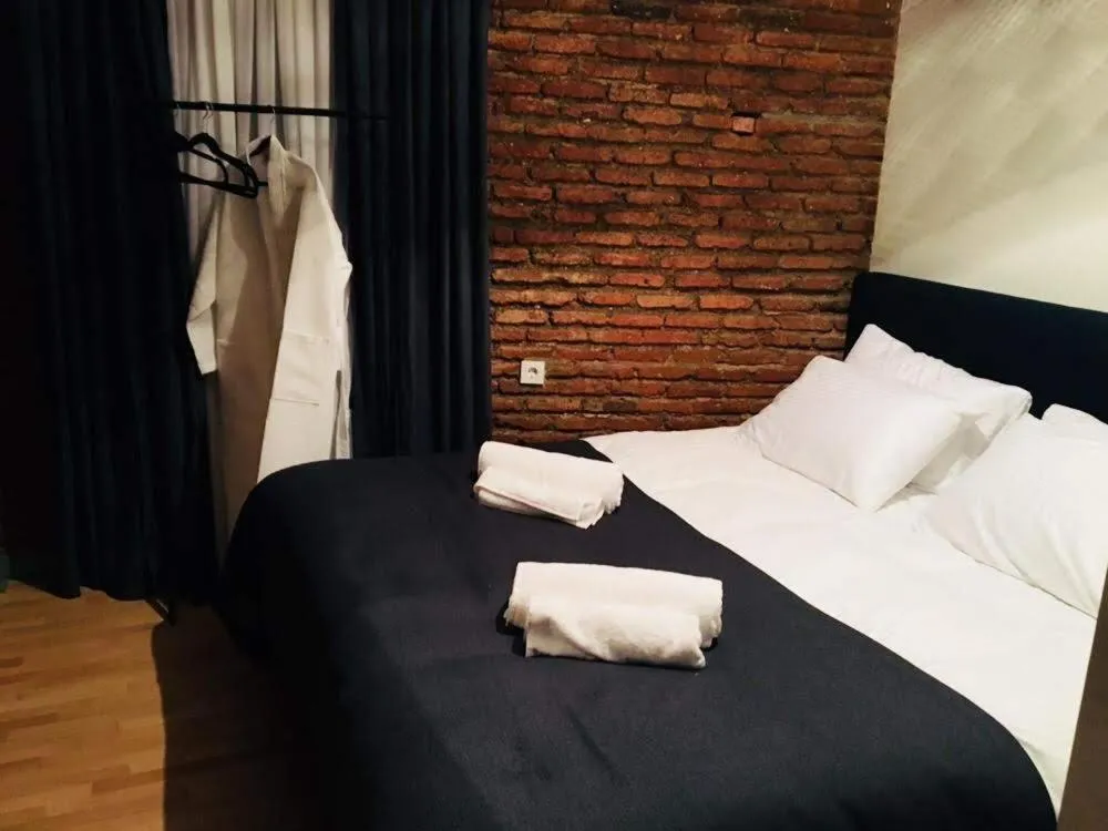 Bed in Ethnograph Hotel old Tbilisi