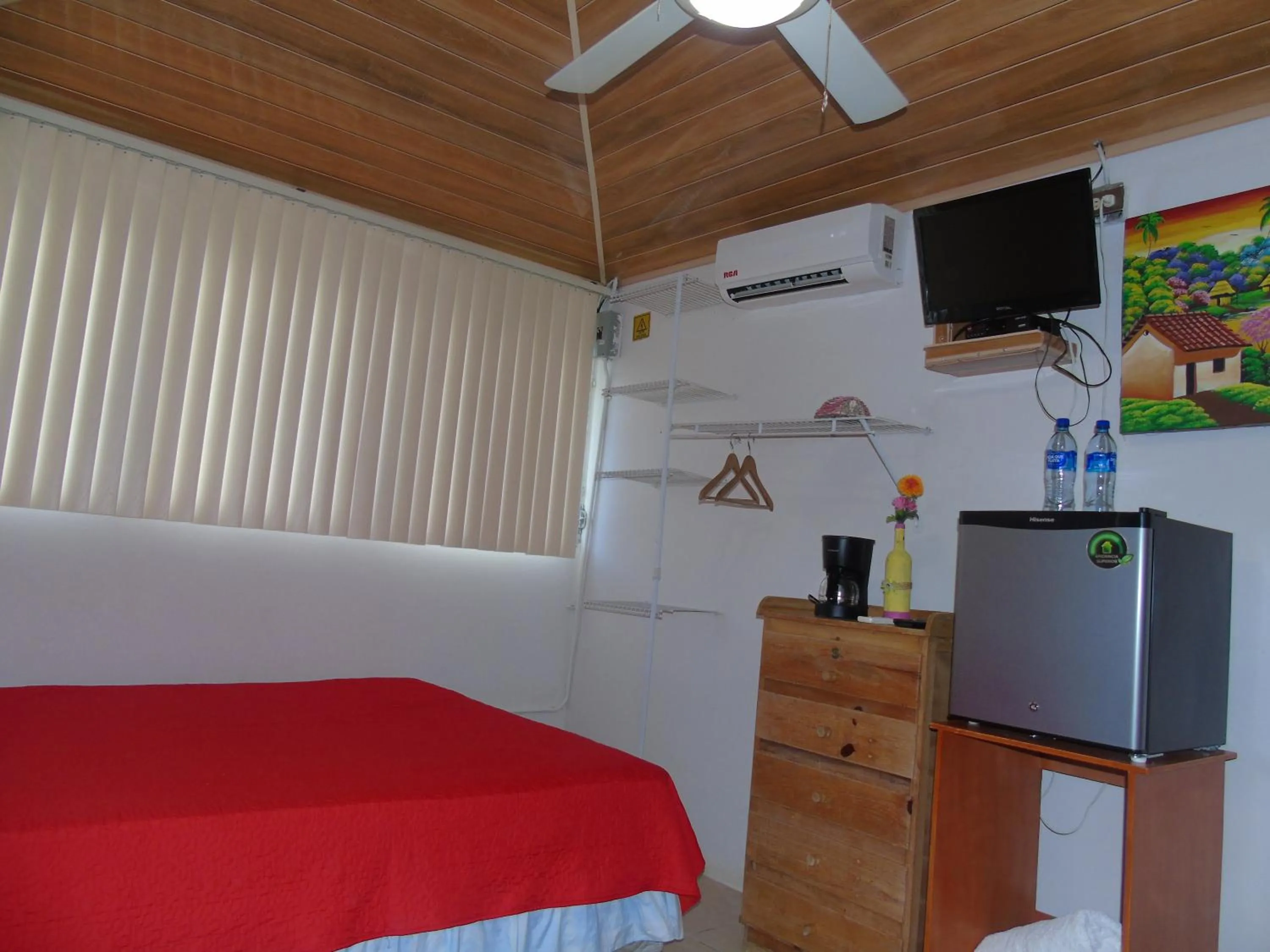 Communal lounge/ TV room, Bed in Hostal Villas Mexico