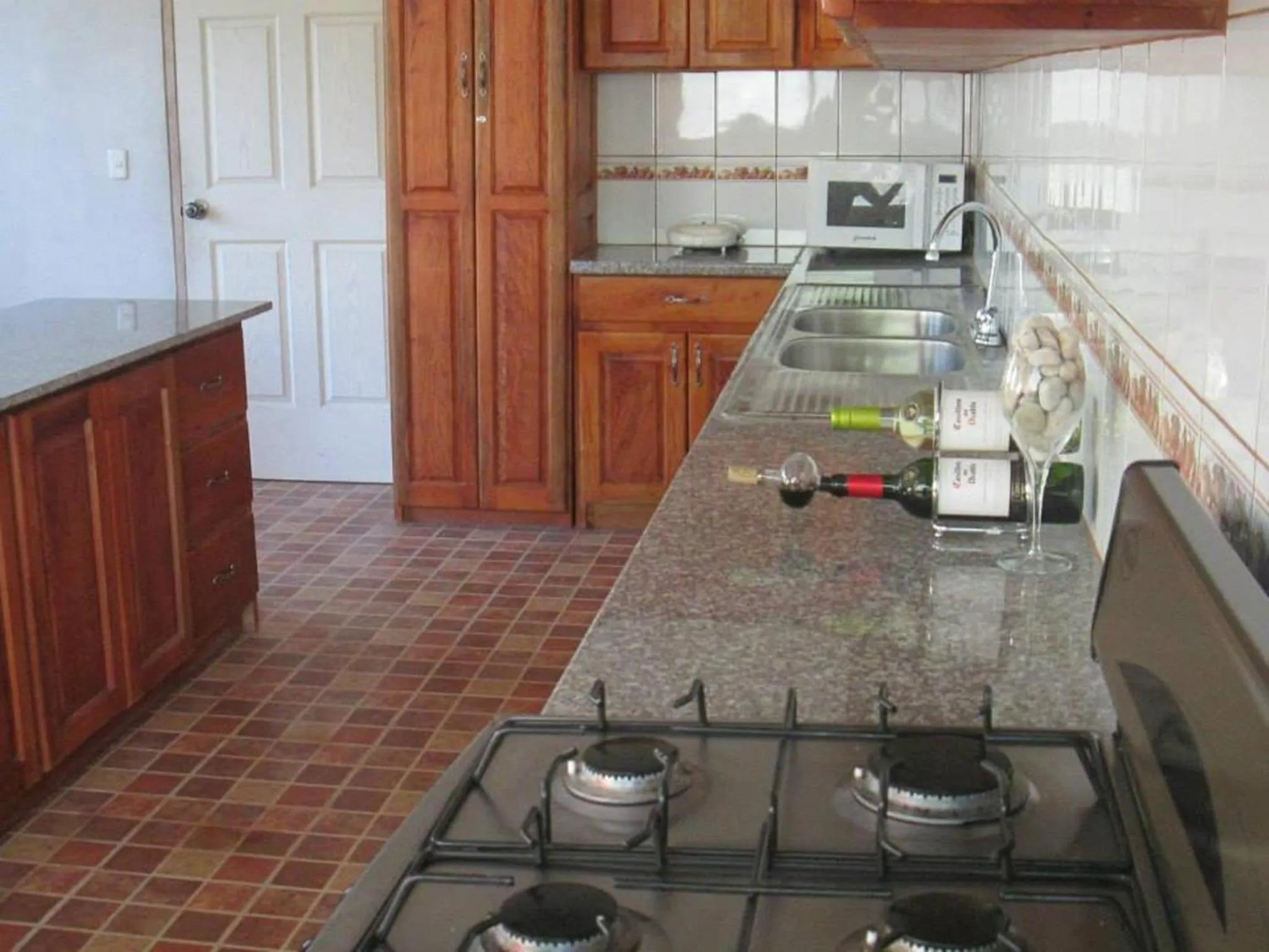 Communal kitchen in Hostal Villas Mexico