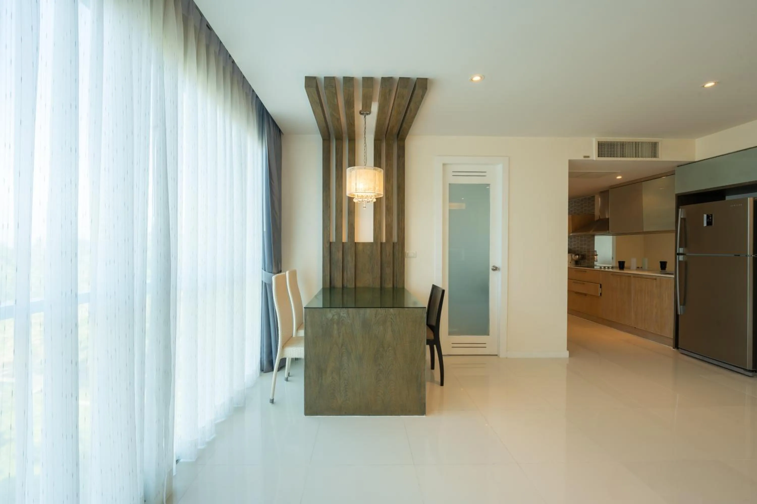 Kitchen or kitchenette in Yenna Apartment