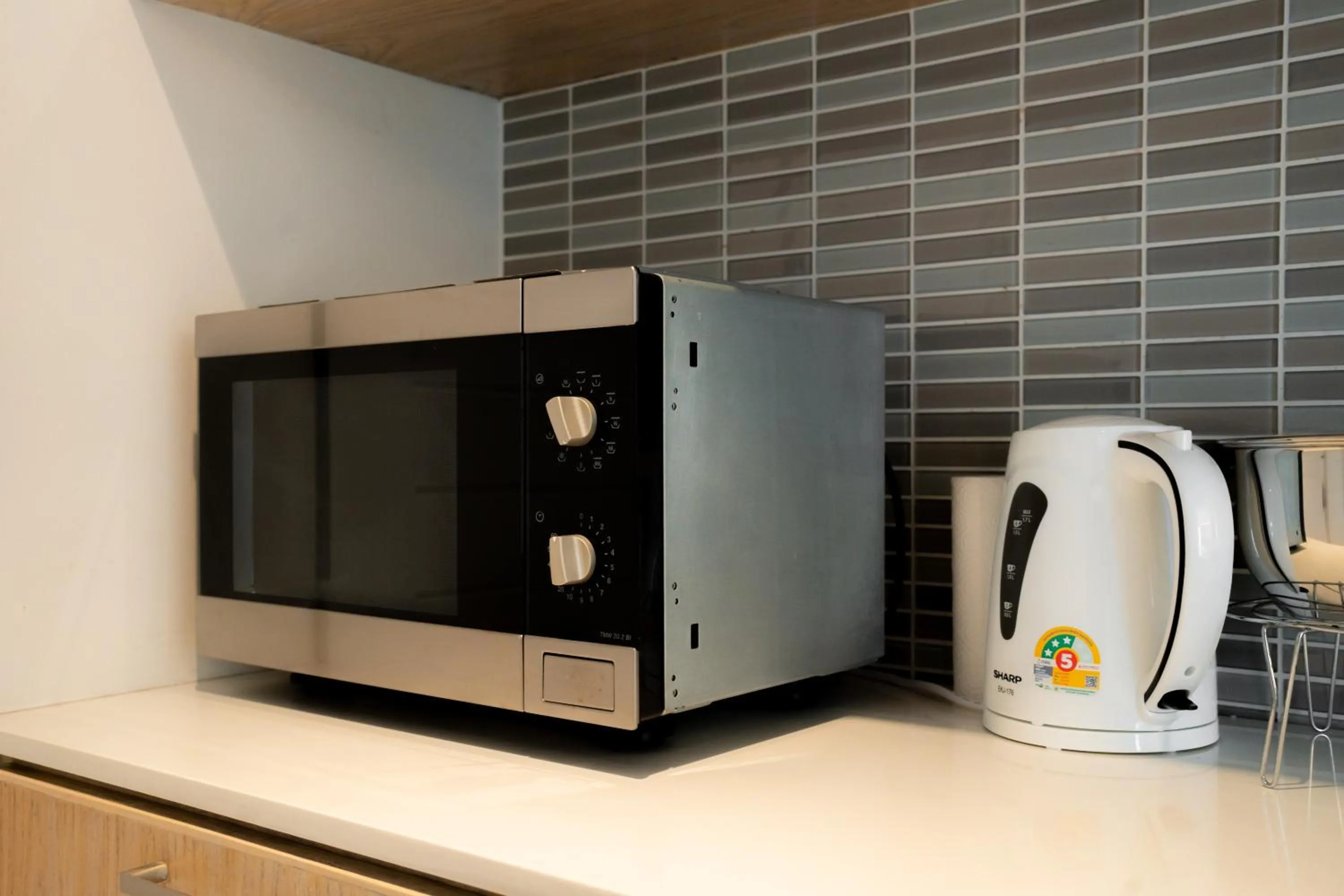 Kitchen or kitchenette in Yenna Apartment