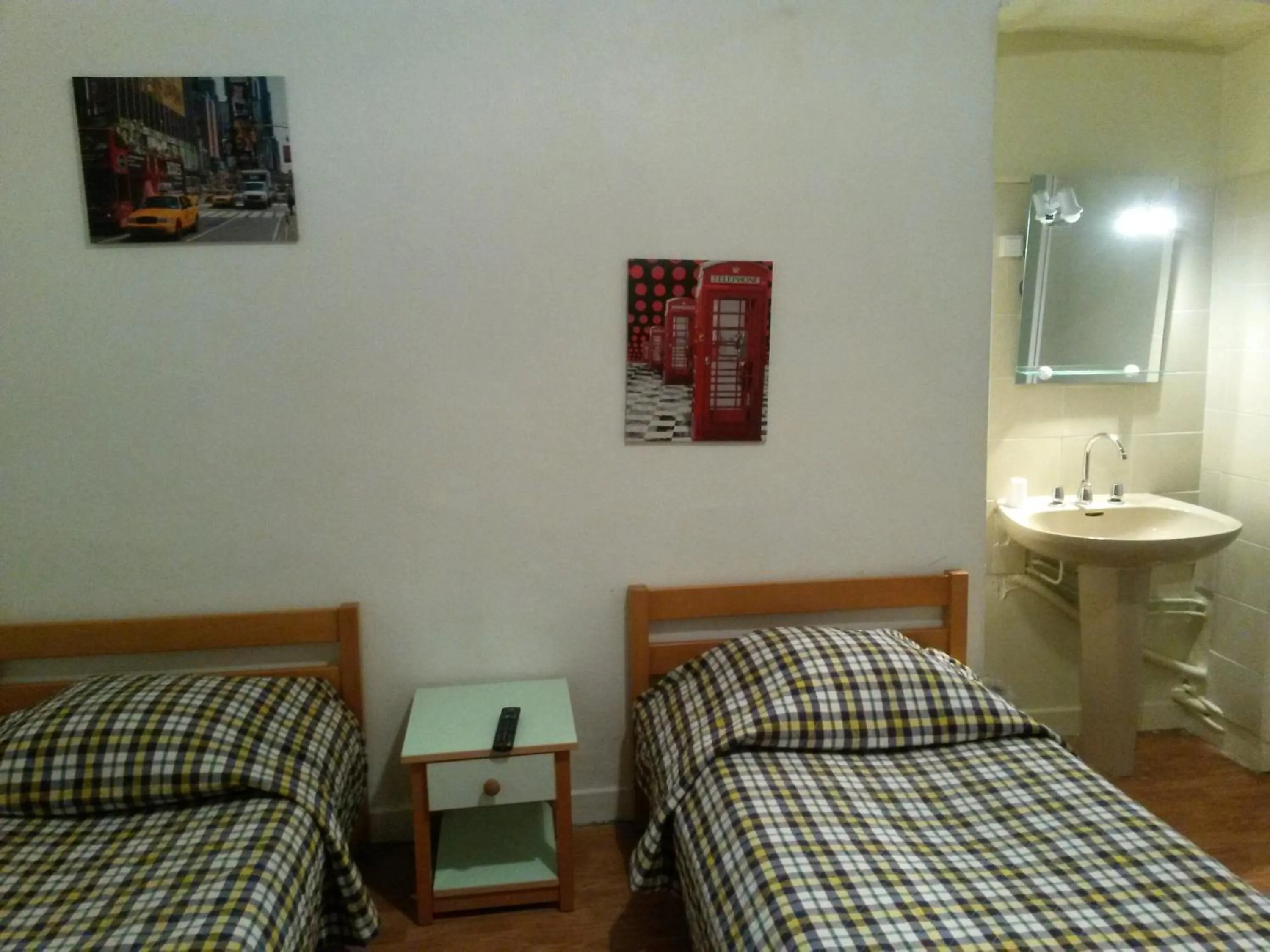 Bed, Seating Area in Hotel Le Tram