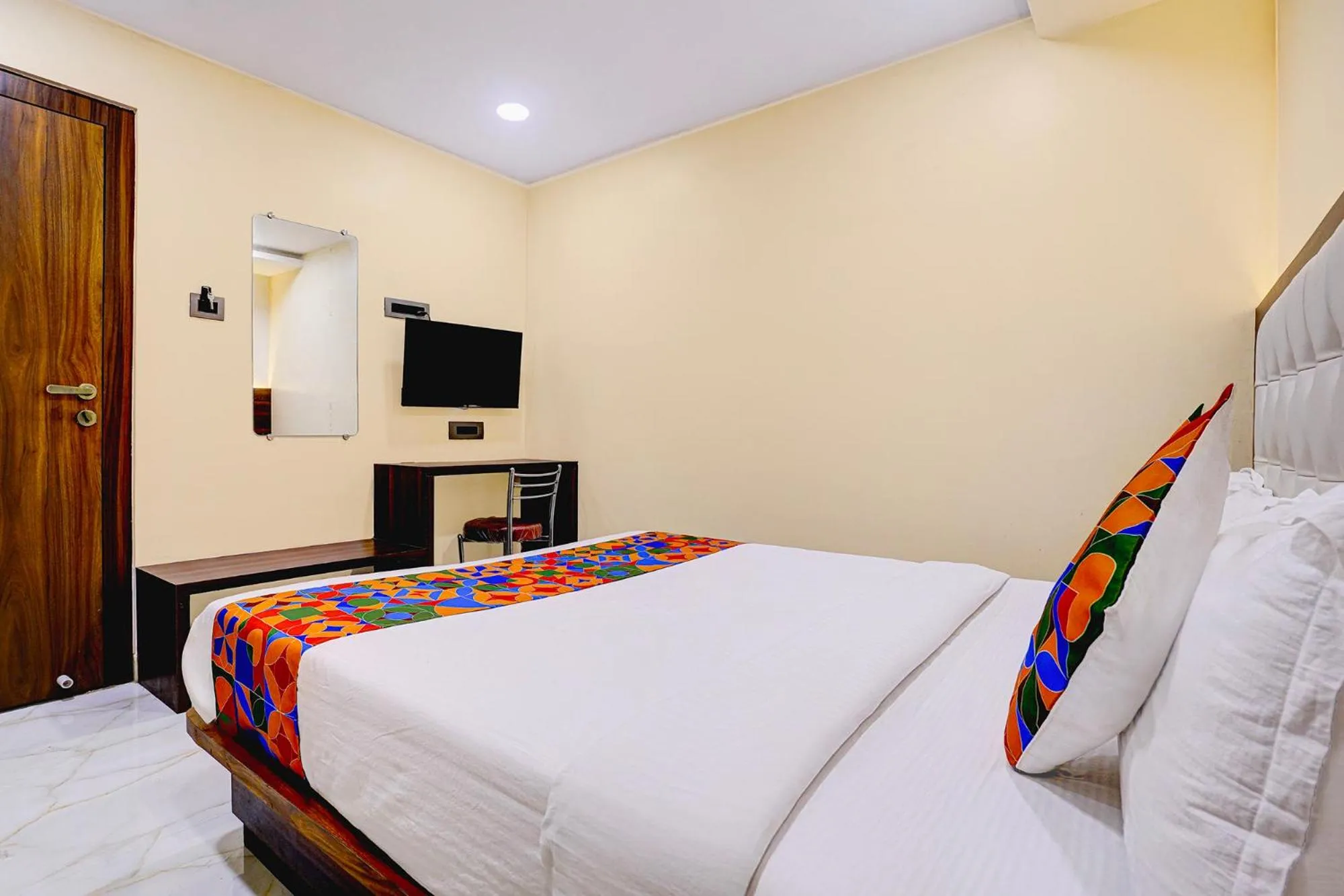 Bed in FabHotel Majestic Crest