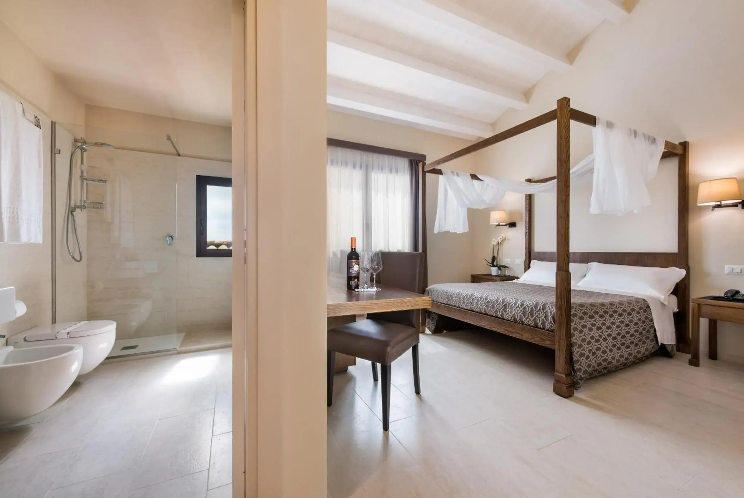 Photo of the whole room, Bed in Firriato Hospitality - Baglio Sorìa Photo of the whole room, Bed in Firriato Hospitality - Baglio Sorìa