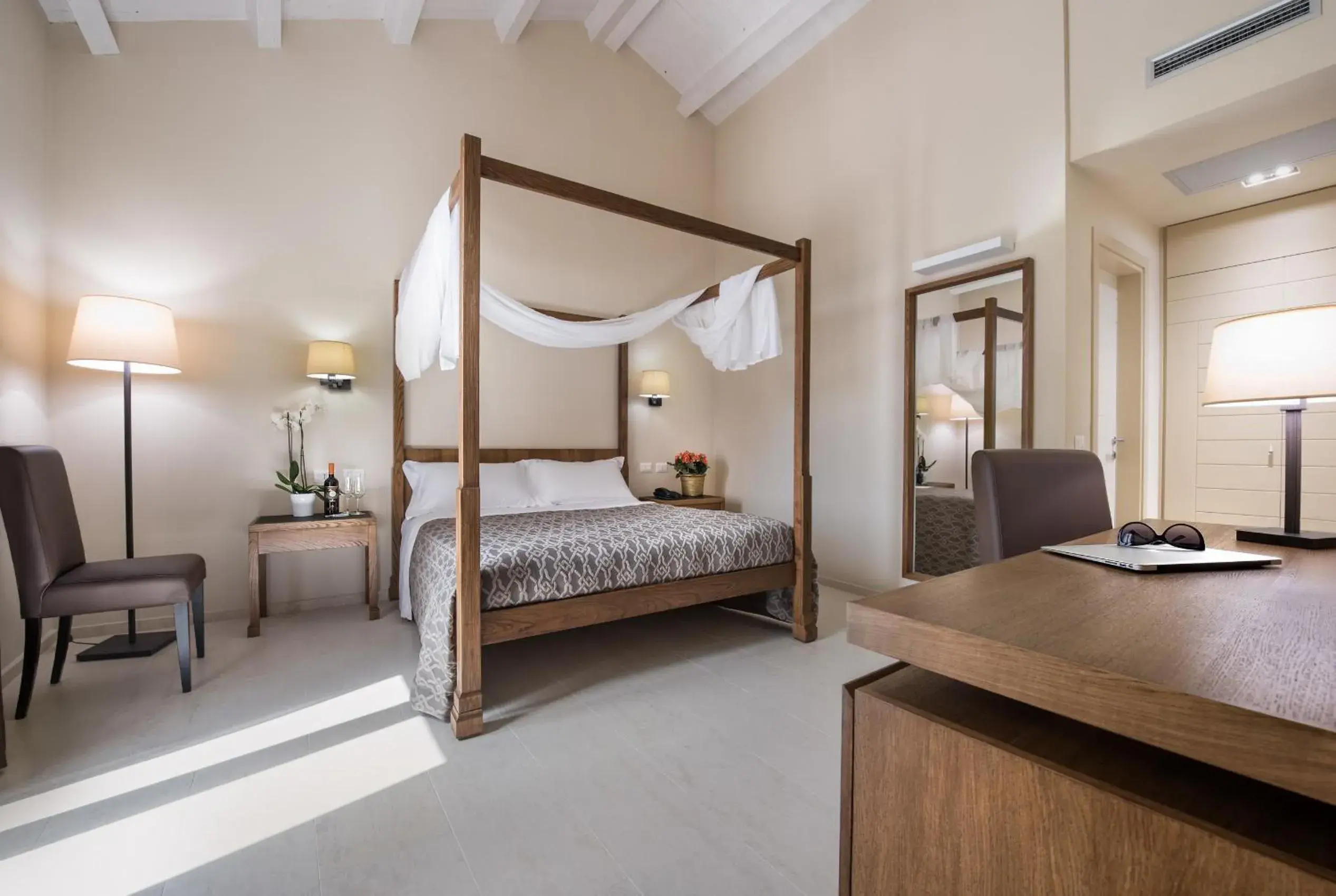 Photo of the whole room, Bed in Firriato Hospitality - Baglio Sorìa Photo of the whole room, Bed in Firriato Hospitality - Baglio Sorìa