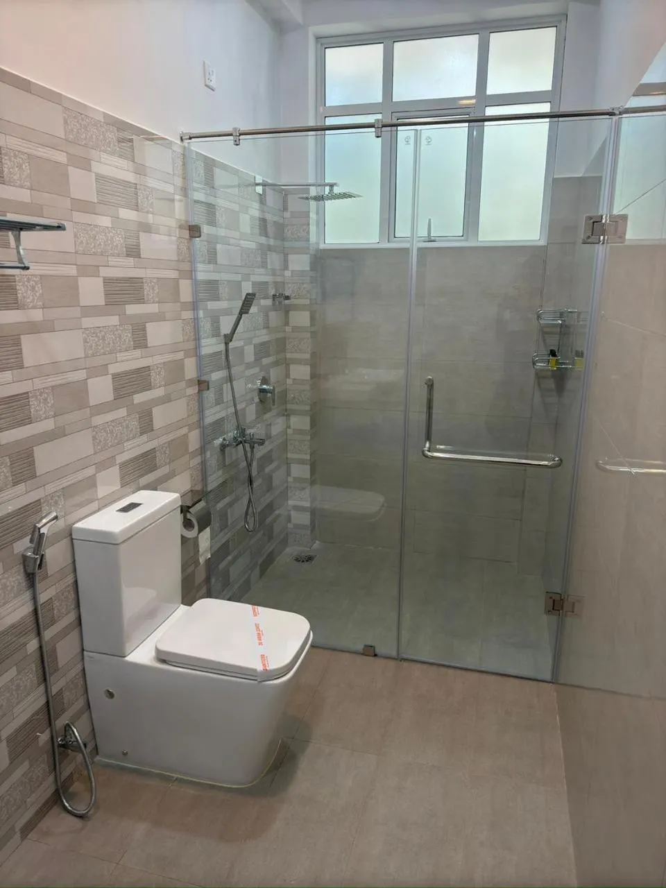 Shower in Aloe Transit Hotel