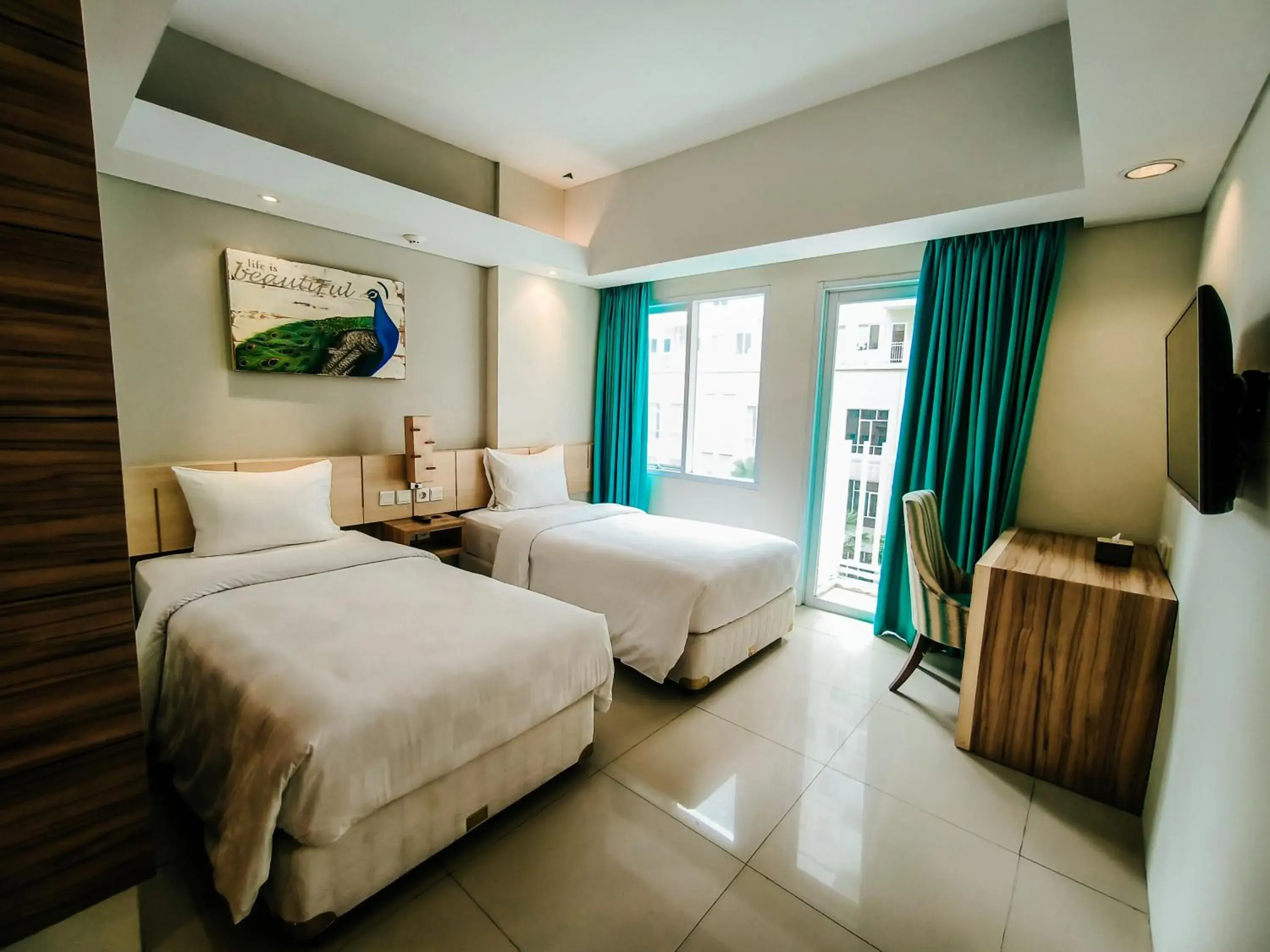 Superior Twin Room in Bogor Icon Condotel By Holla Superior Twin Room in Bogor Icon Condotel By Holla