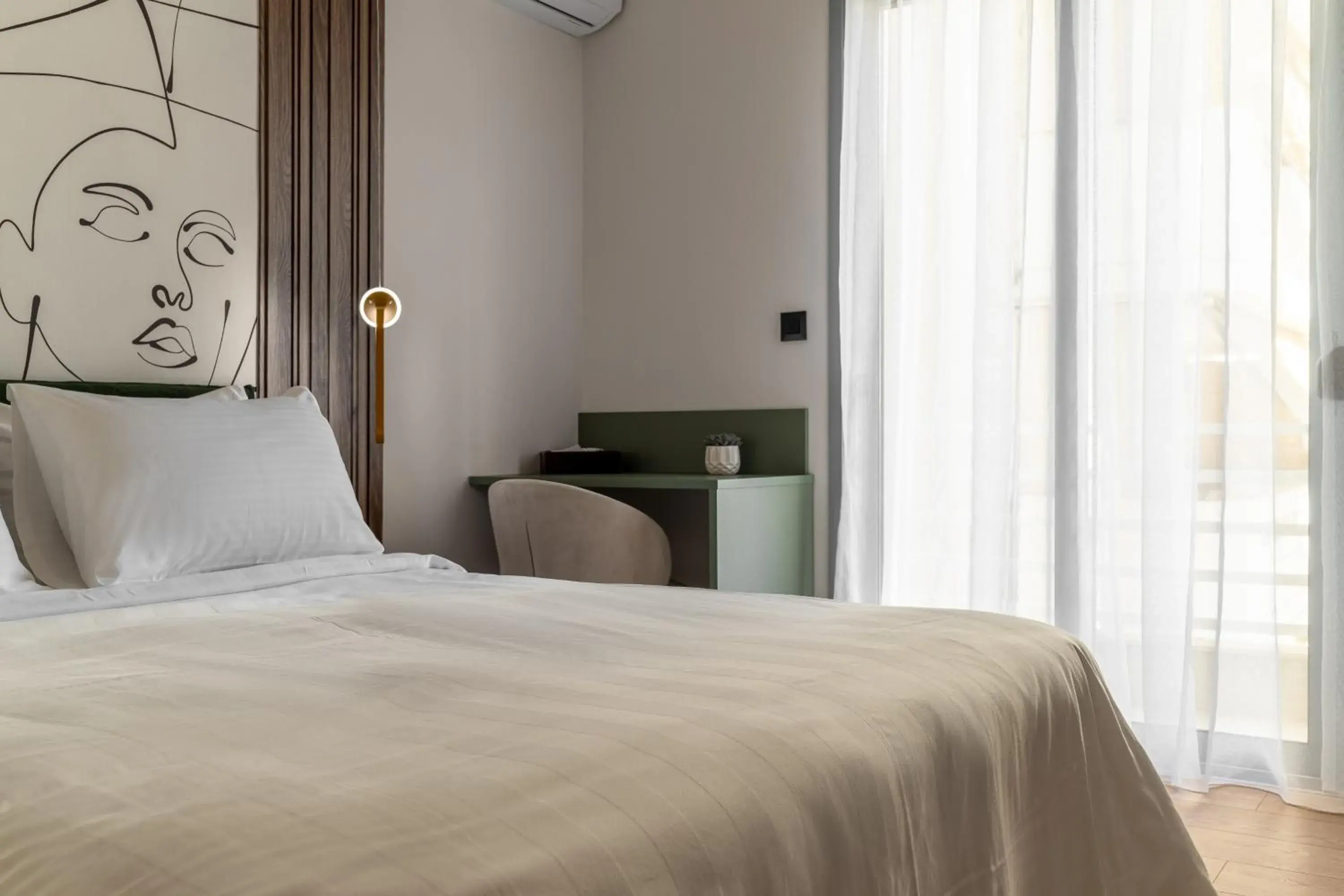 Bed in Phalerus Suites Bed in Phalerus Suites