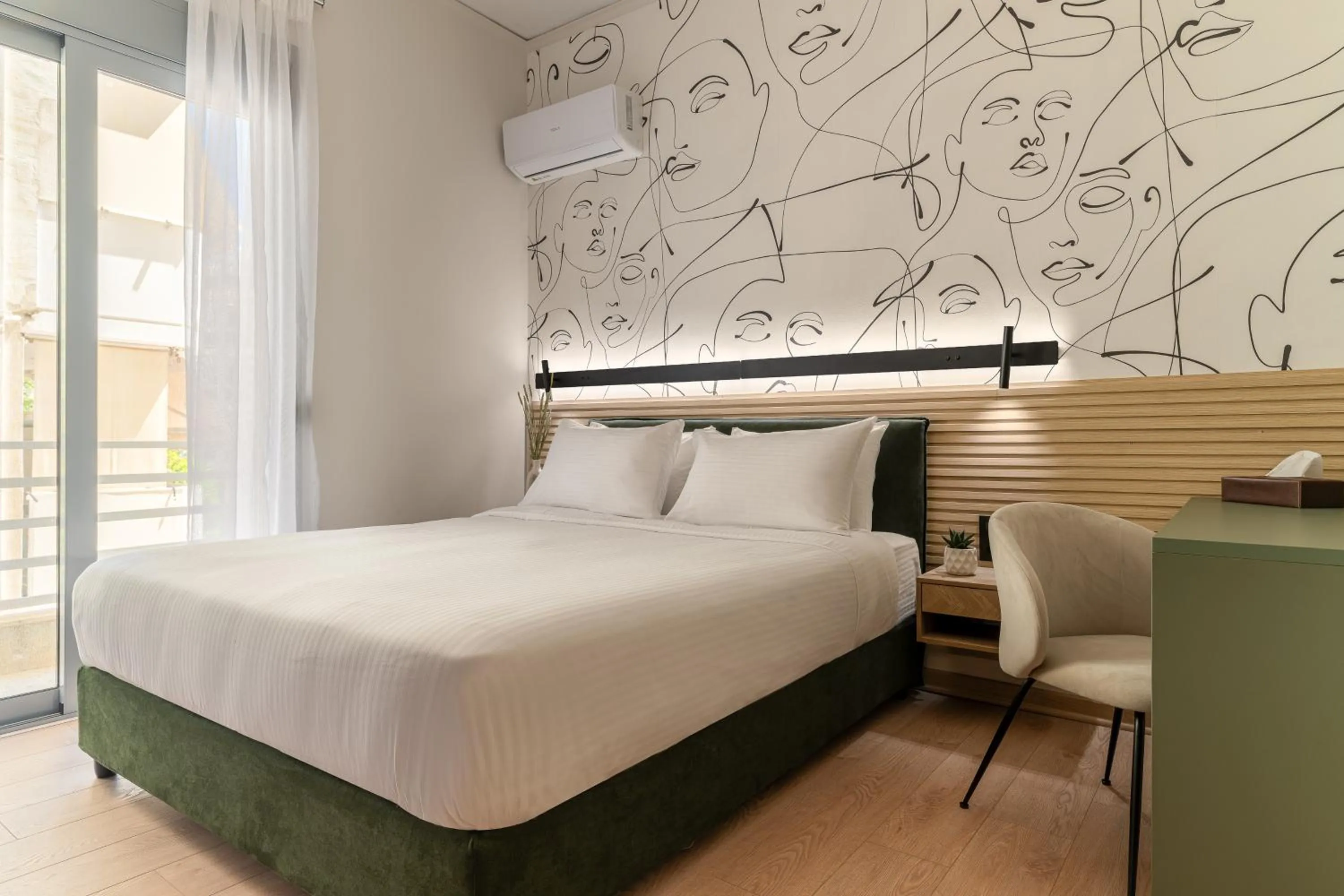 Bed in Phalerus Suites