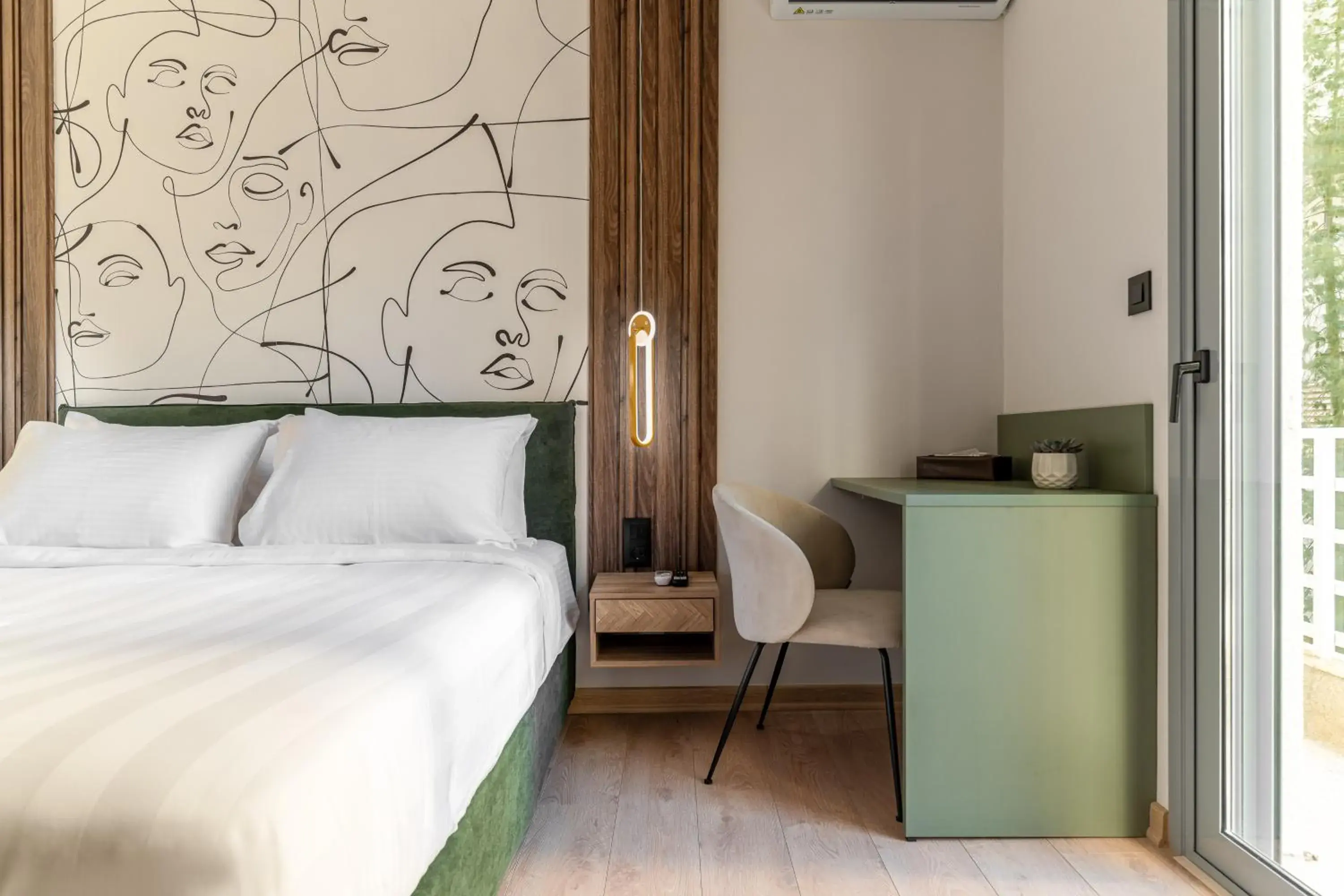 Bed in Phalerus Suites Bed in Phalerus Suites