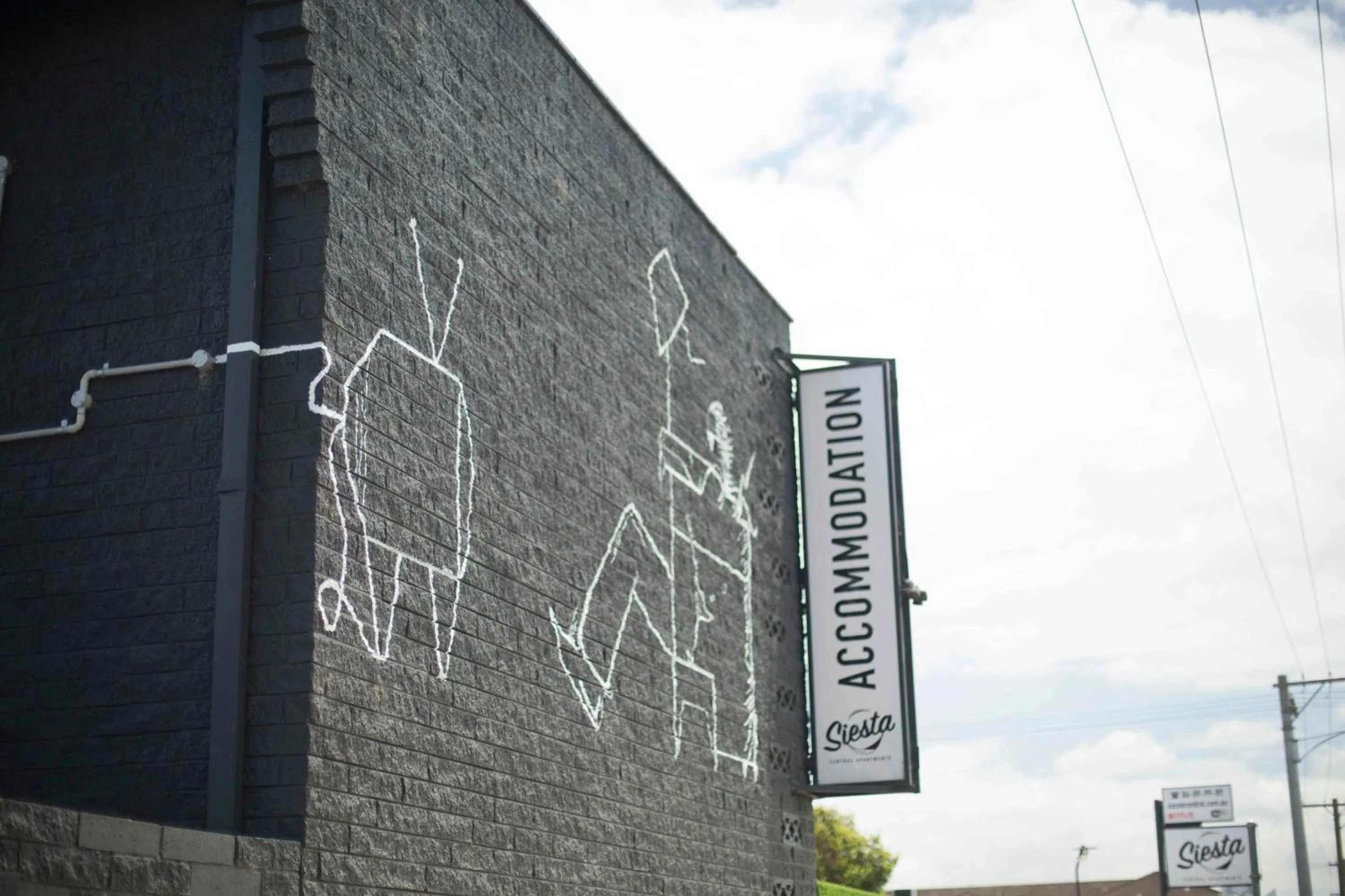 Logo/Certificate/Sign in Siesta Central Apartments