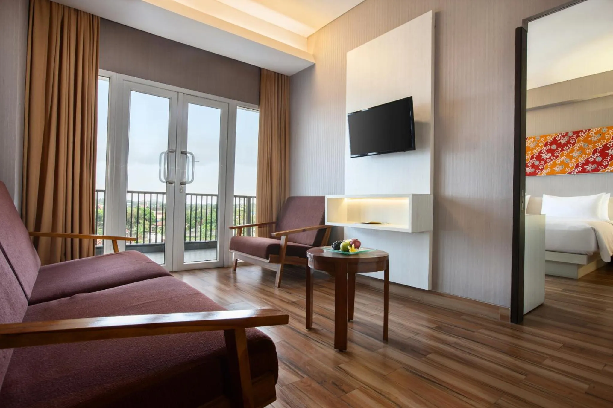 View (from property/room), Bed in Hotel Santika Banyuwangi