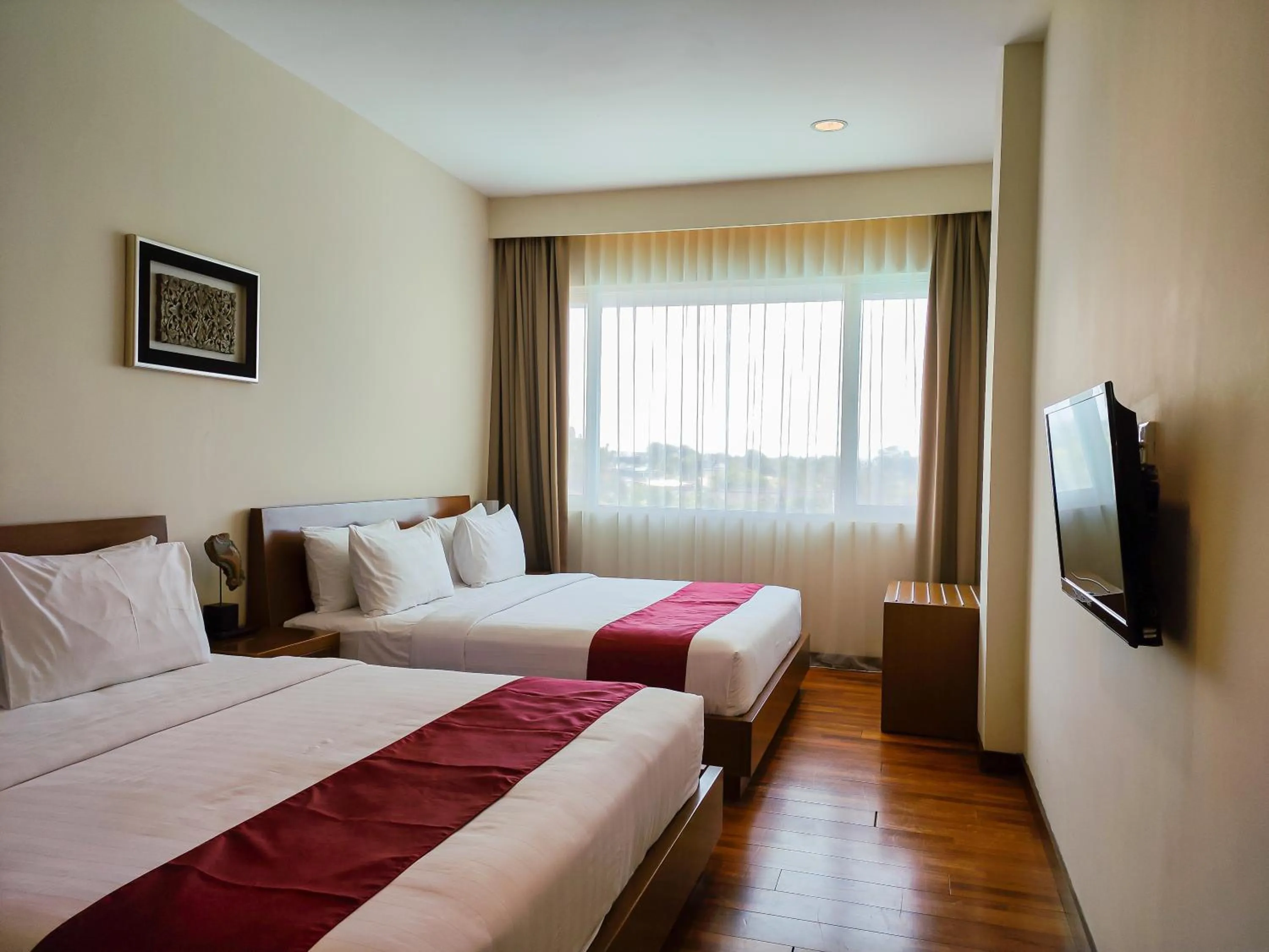 Bed in Seminyak Square Hotel And Villas