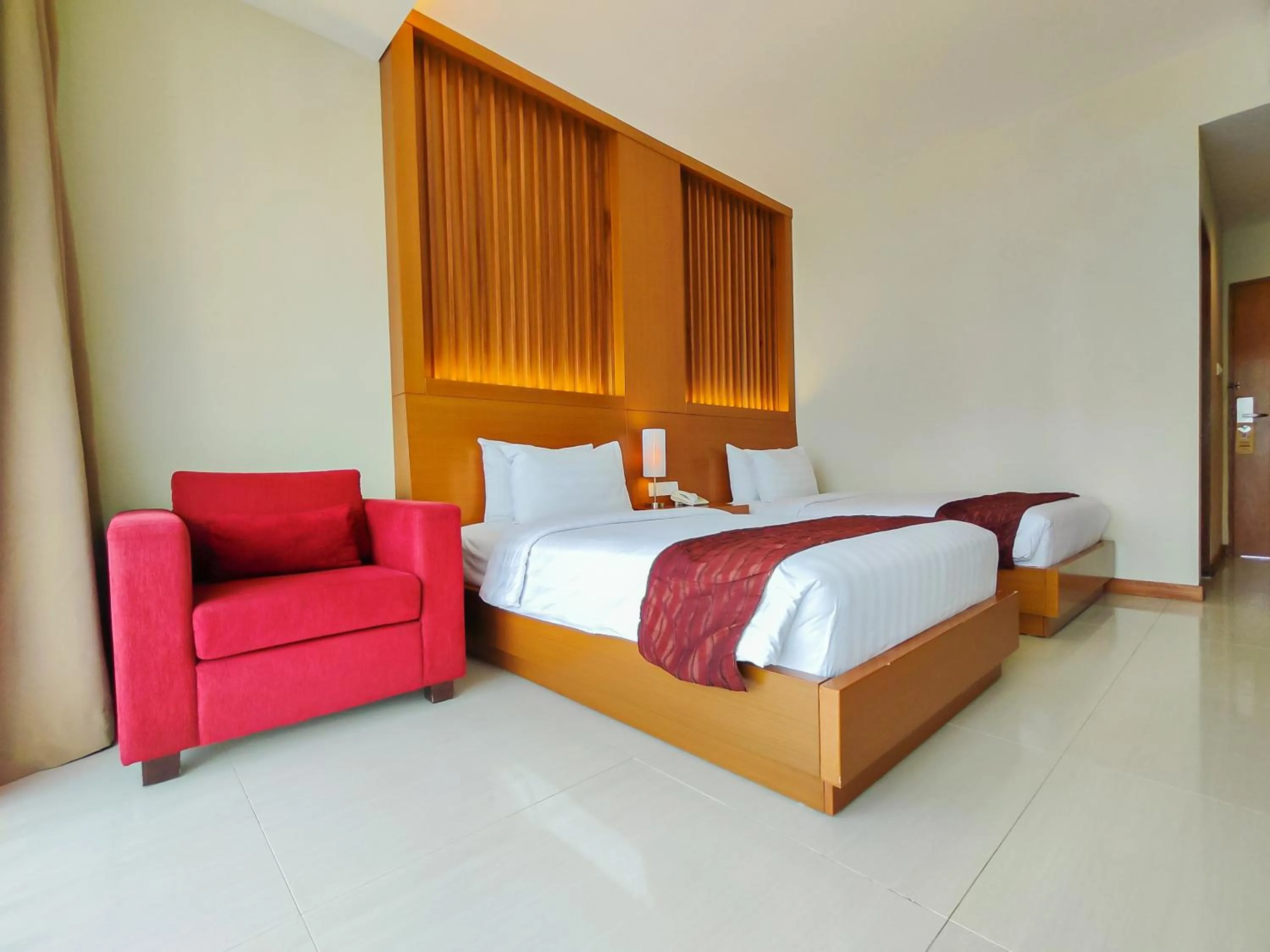 Bed in Seminyak Square Hotel And Villas