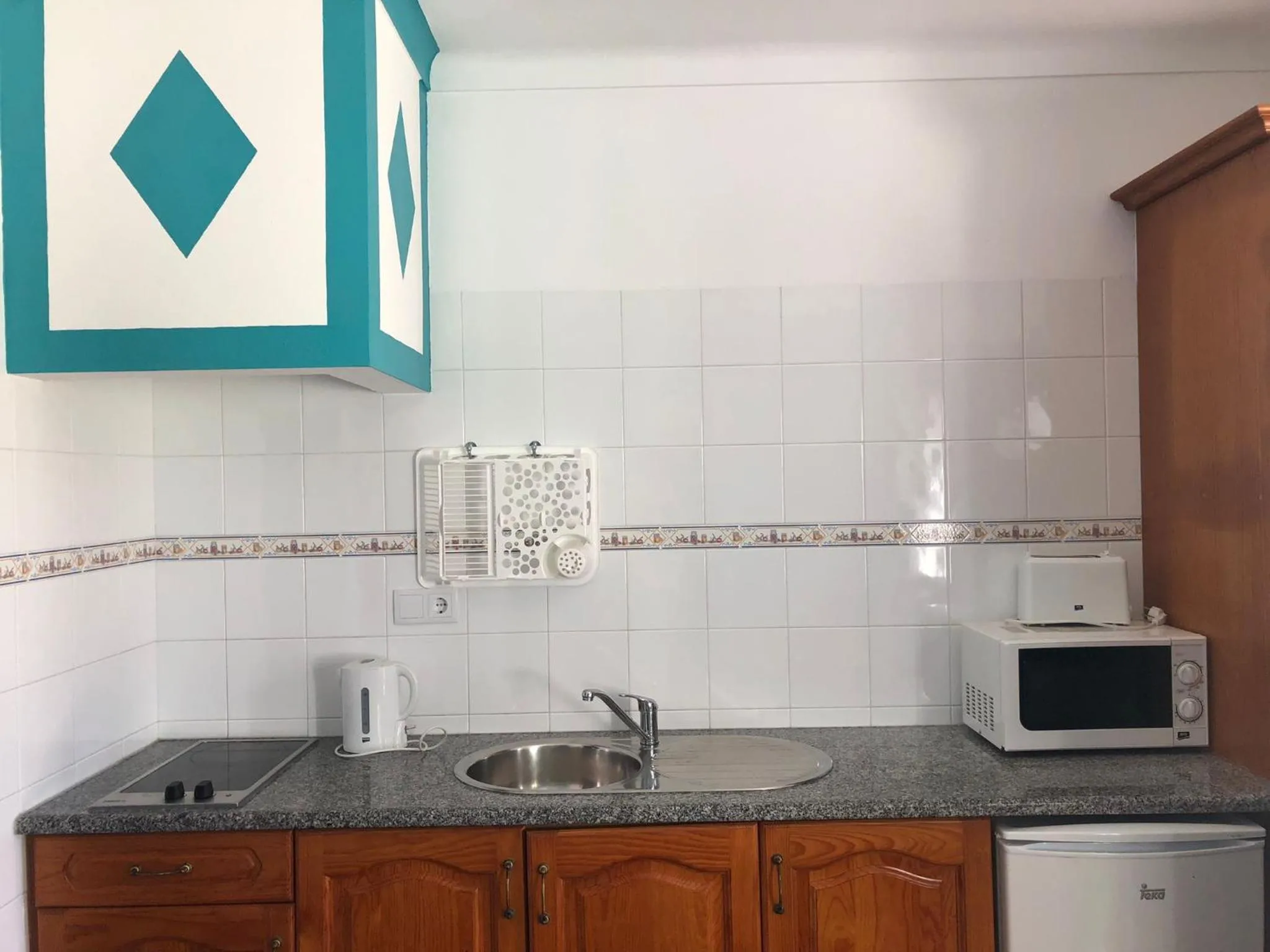 Kitchen or kitchenette in Camping Villa Park Zambujeira do Mar
