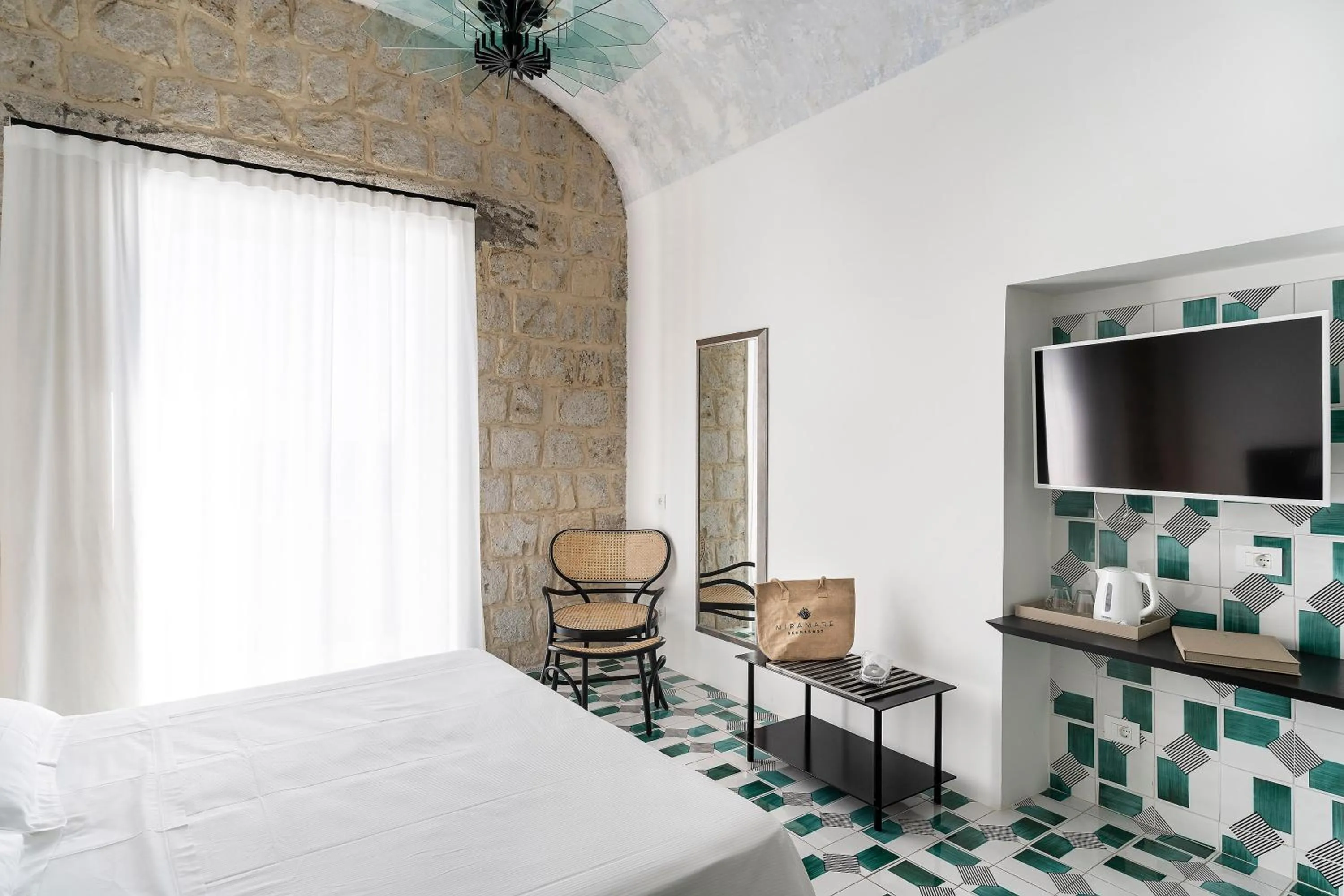 Communal lounge/ TV room, Bed in Miramare Sea Resort & Spa