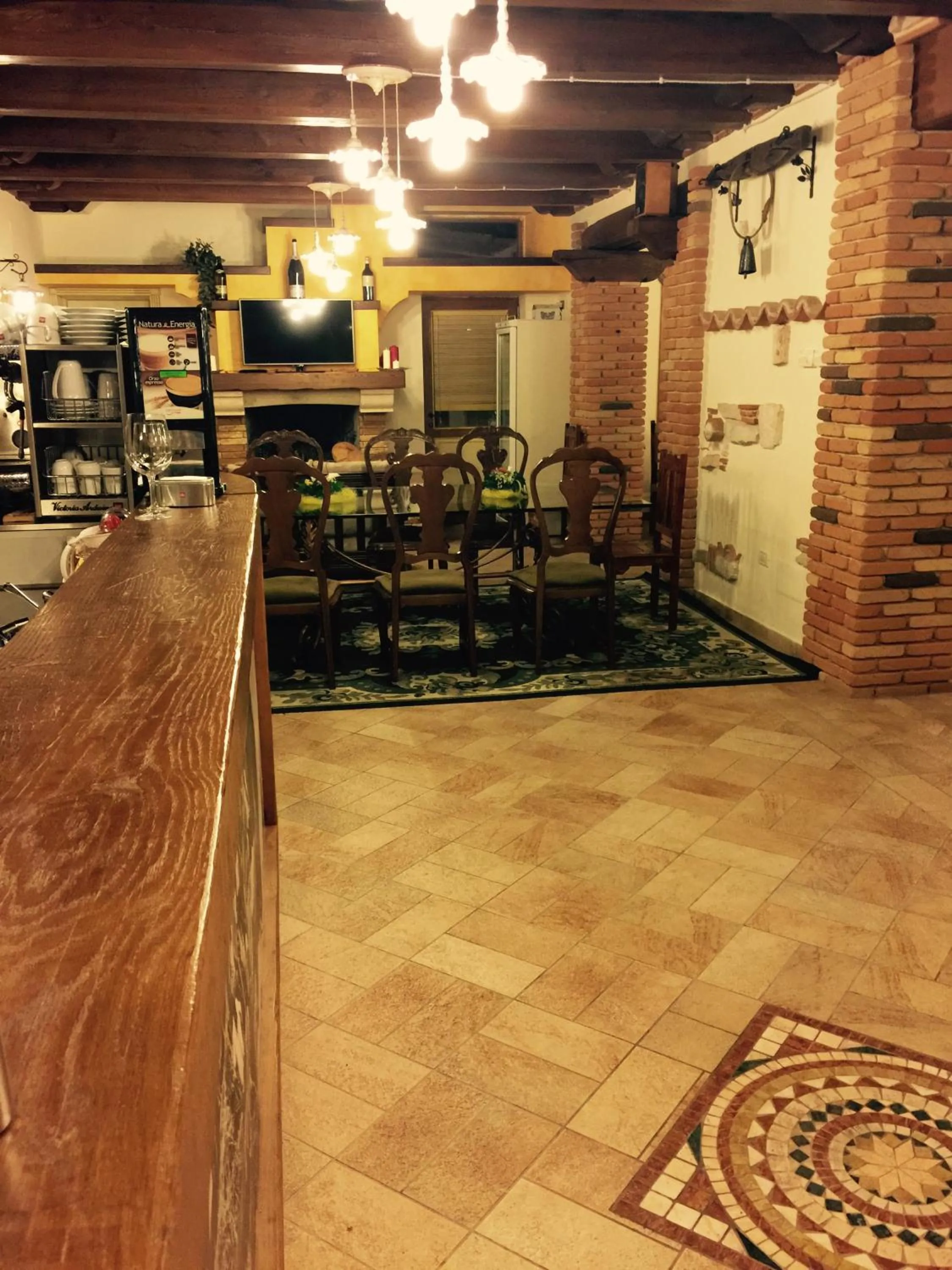 Communal lounge/ TV room in La Castellaia Resort