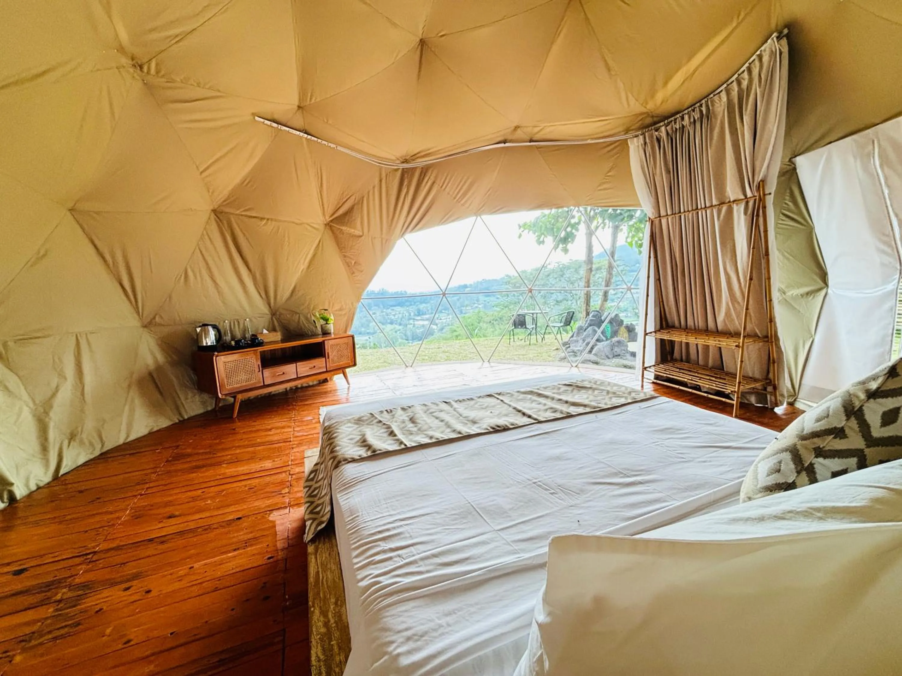 Bed in De'Ra Hills Camp Kintamani
