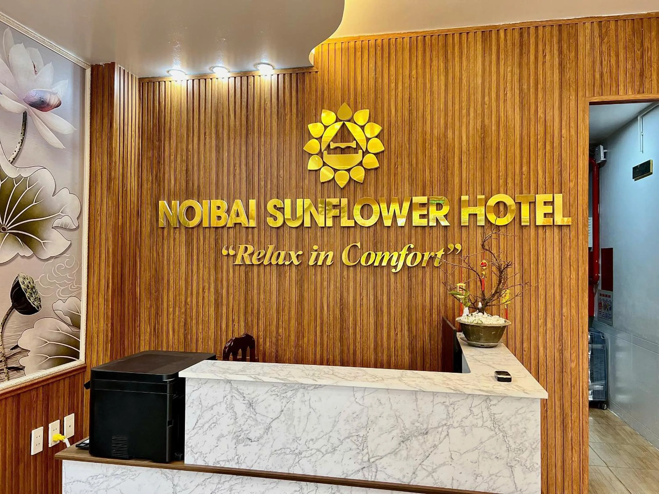 Property logo or sign in Noi Bai Sunflower Hotel