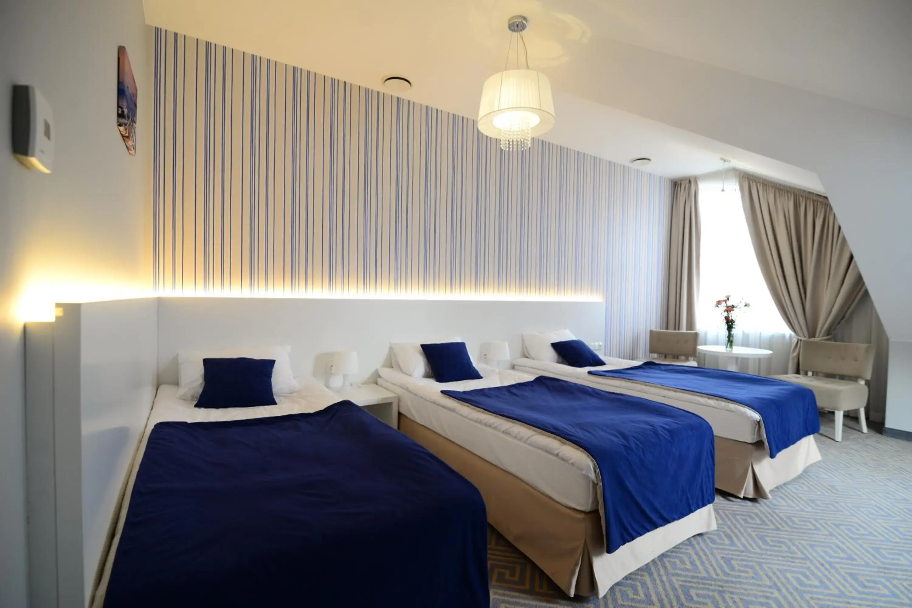 Triple Room with Shower in Hotel Aleksandria Triple Room with Shower in Hotel Aleksandria