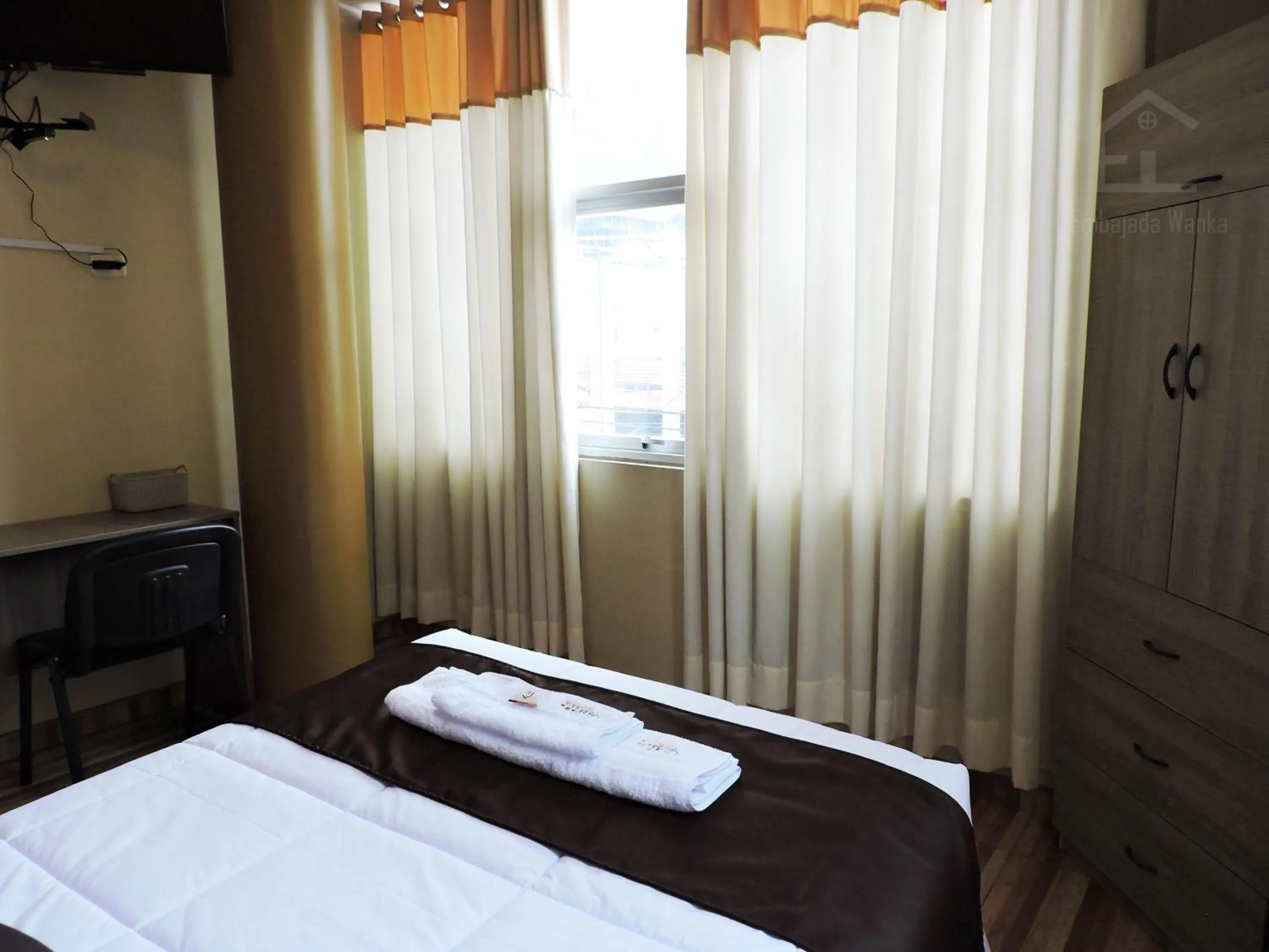 Photo of the whole room, Bed in EmbajadaWanka