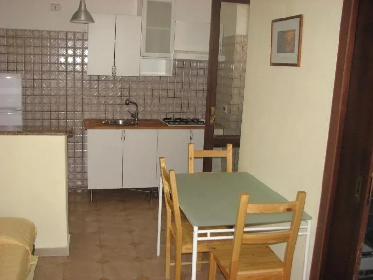 Kitchen or kitchenette in Elios Residence Hotel