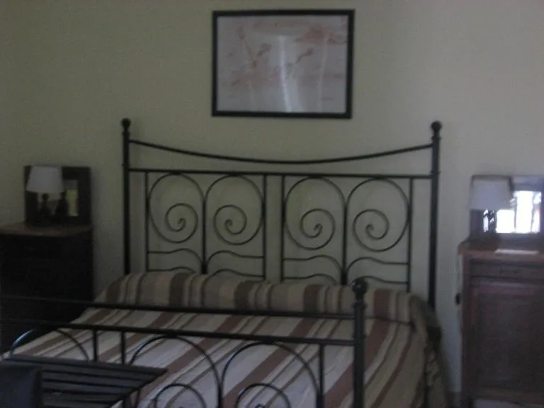 Bed in Elios Residence Hotel