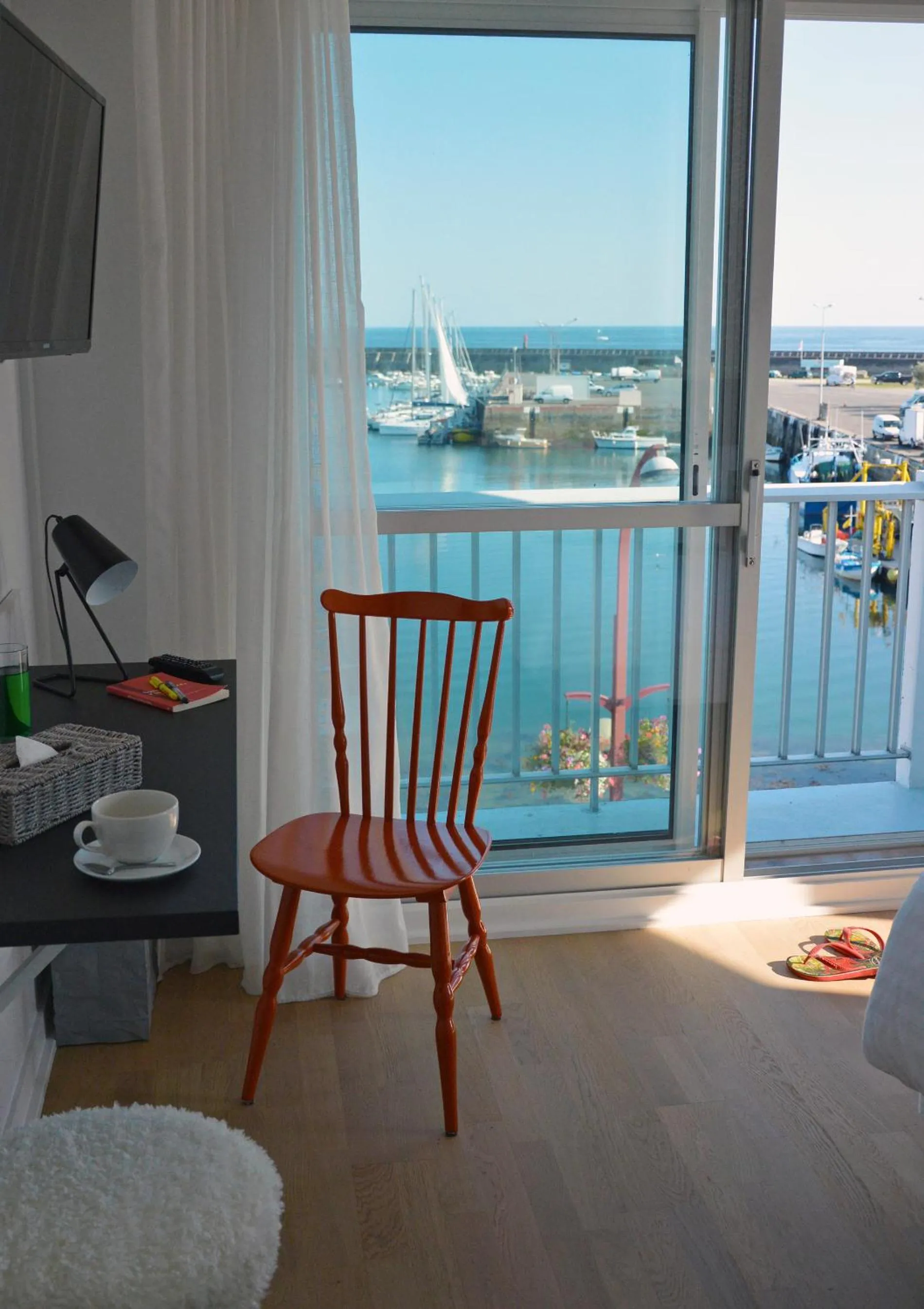 Seating area in Logis Hotel Du Port