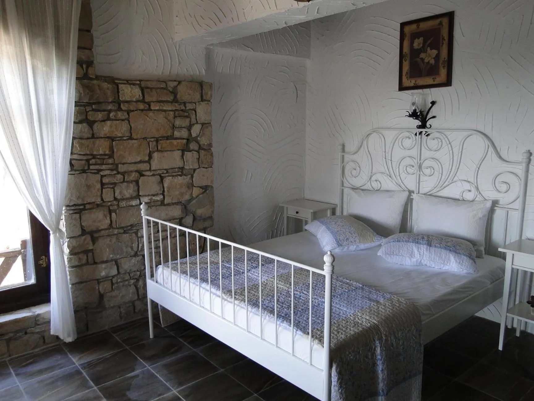 Bed in The Stone Castle Boutique Hotel