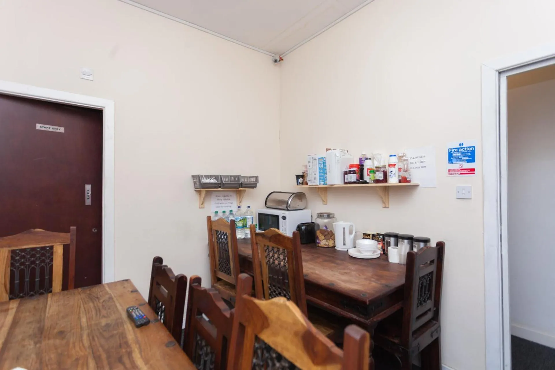 Communal lounge/ TV room in Budget Hostel